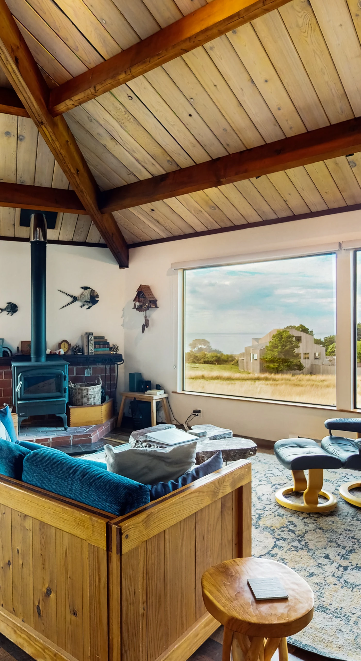 Sunlight dances across the spacious living room, inviting you to relax and soak in the ocean views.