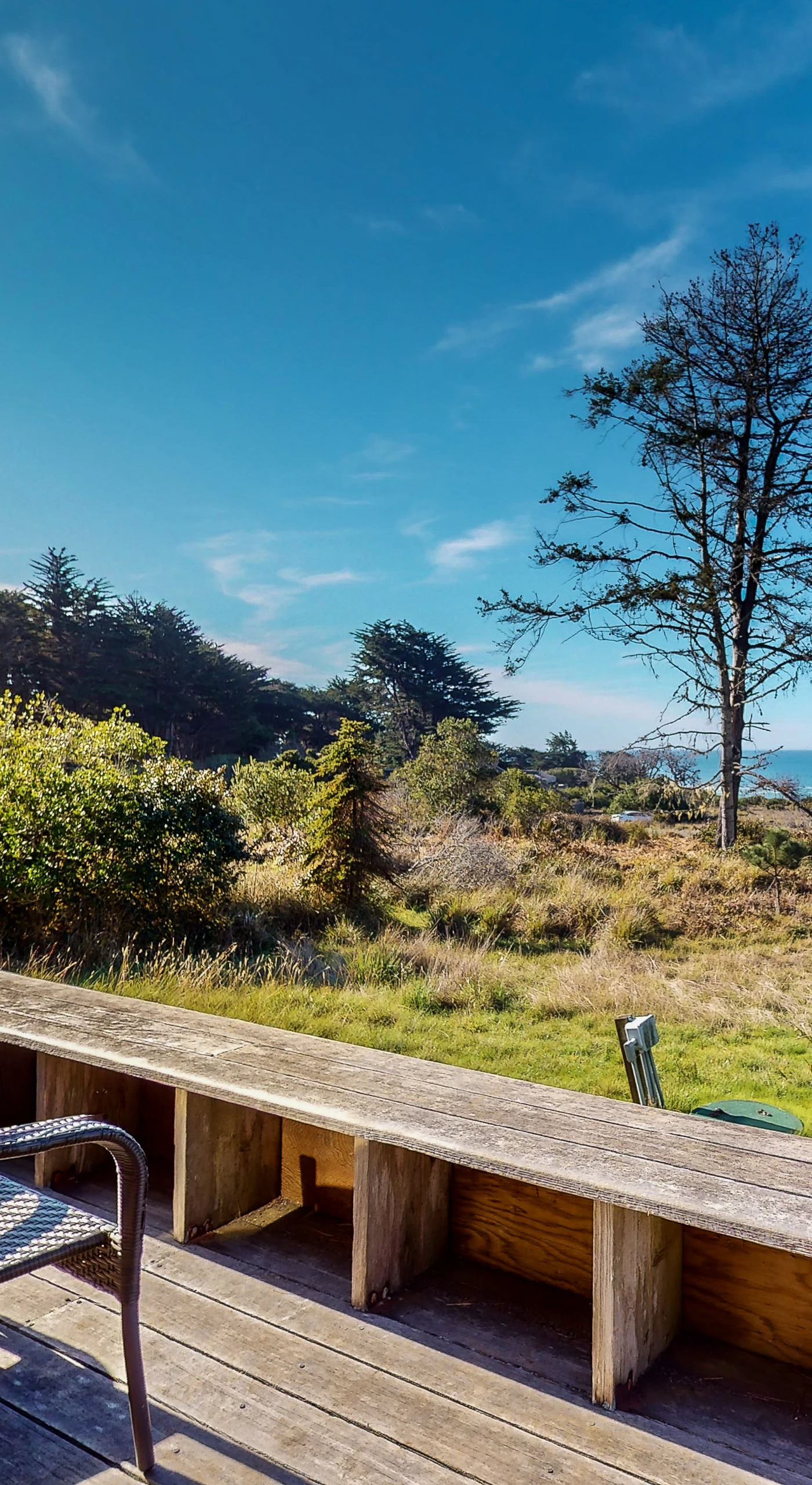 Savor your morning coffee on the spacious deck, where breathtaking ocean views and coastal breezes set the perfect backdrop for relaxation.