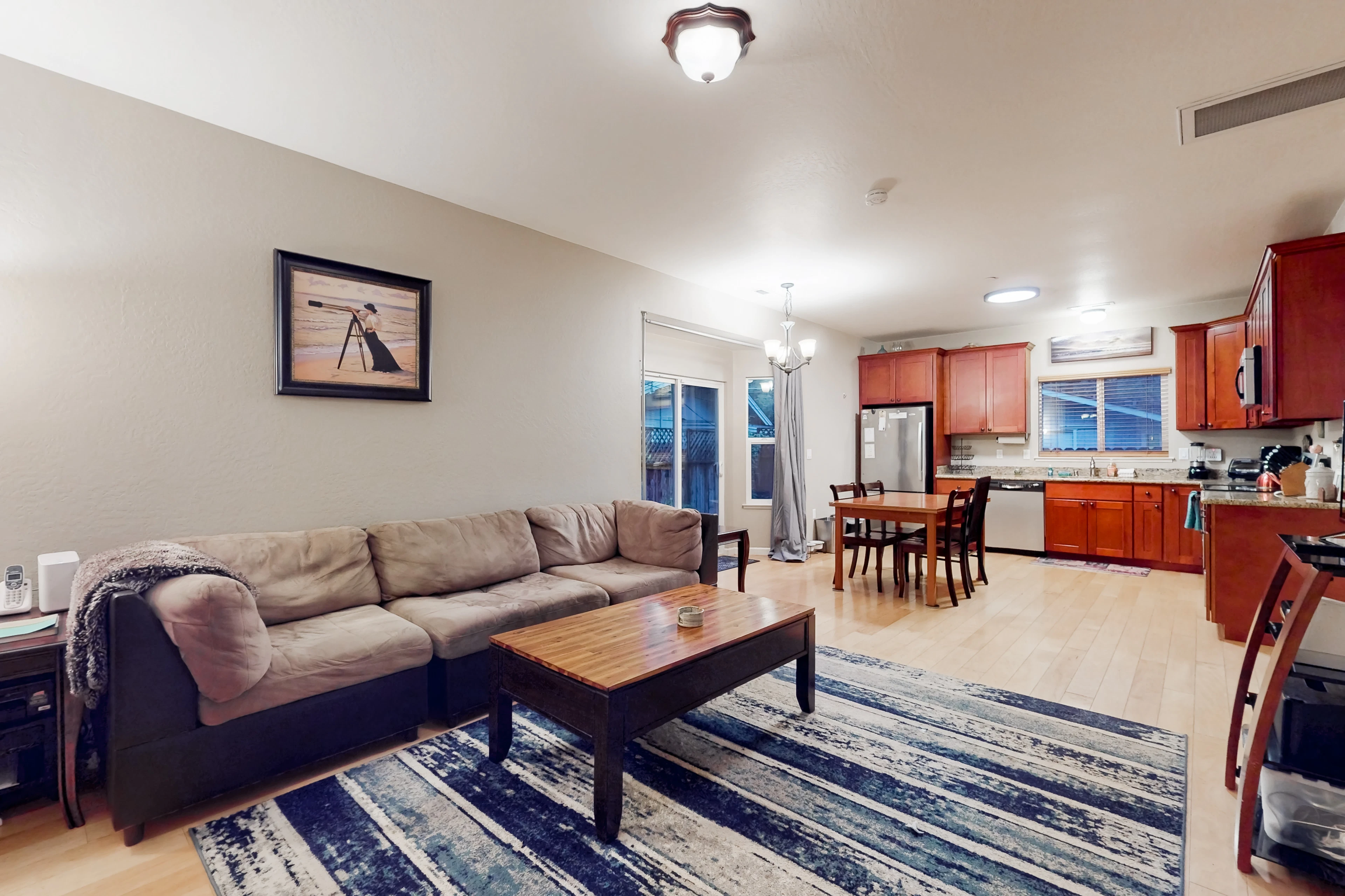 Settle into your open-concept living space with plush sectional seating and a fully equipped kitchen steps away — perfect for planning your Sonoma wine country adventures.
