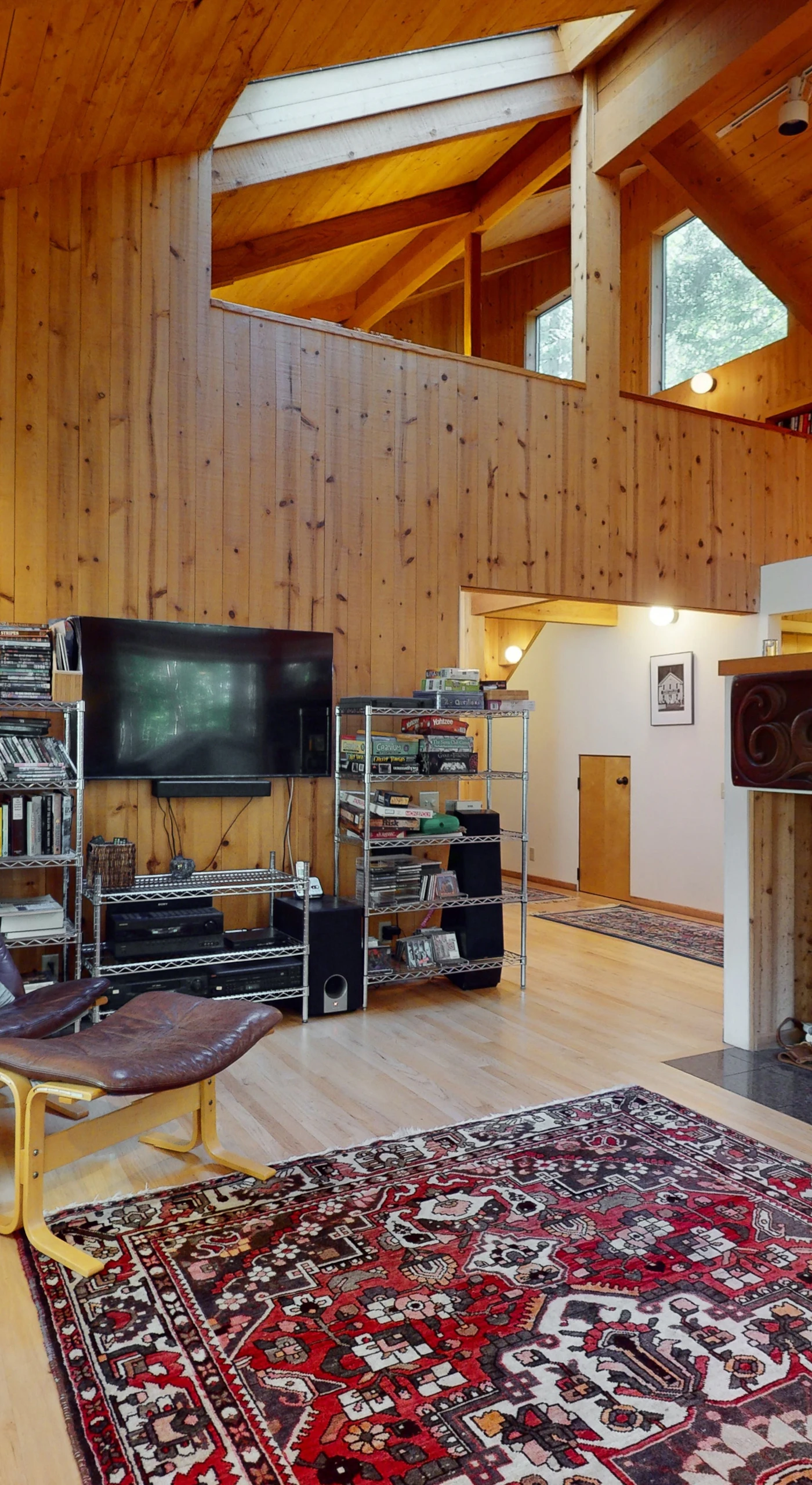 Gather around the wood-burning fireplace in the living room, where cozy evenings await, filled with laughter and stories shared with loved ones.