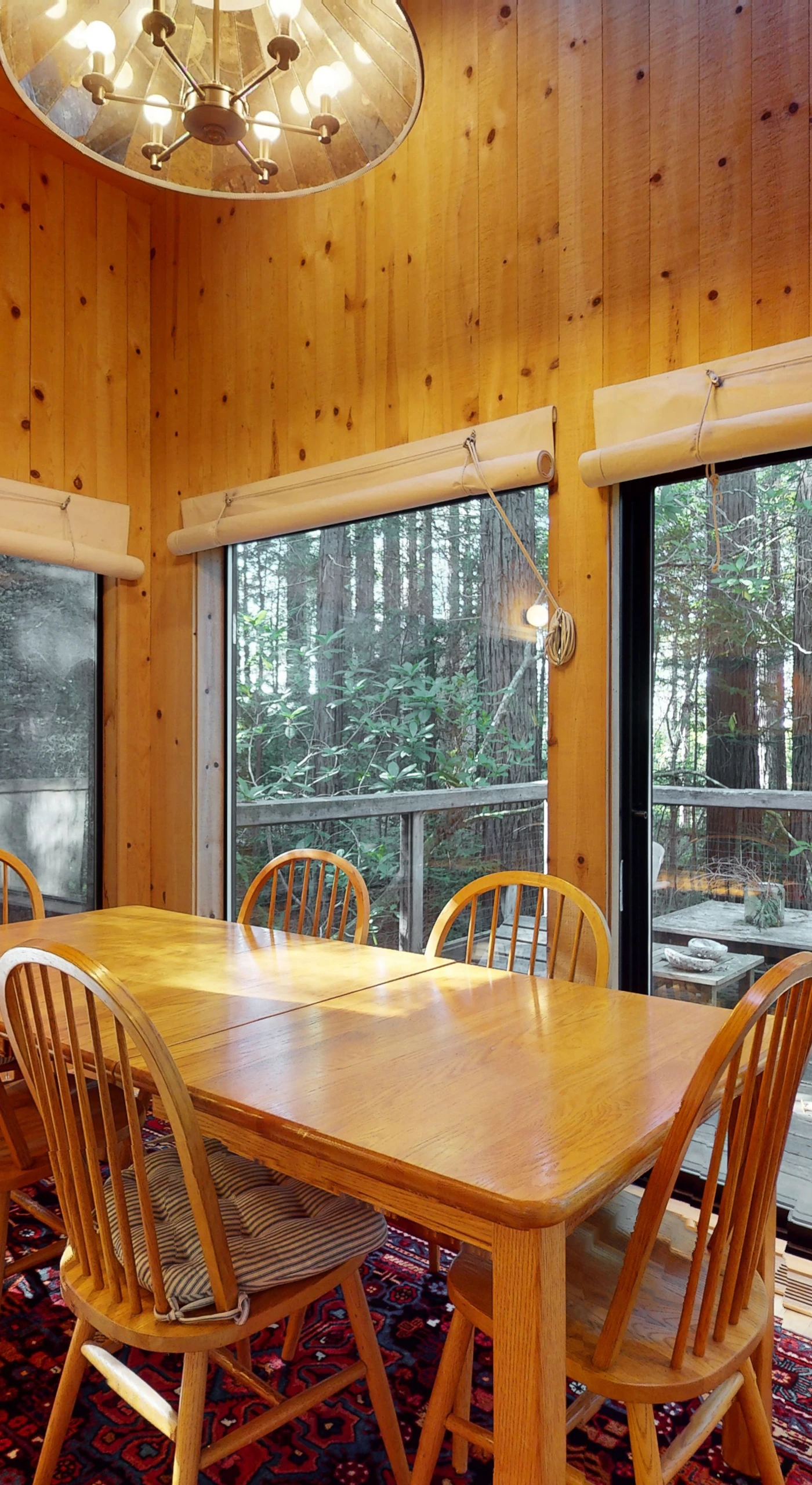 Share meals and memories around the dining table, where the peaceful views of the surrounding woods enhance every dining experience.