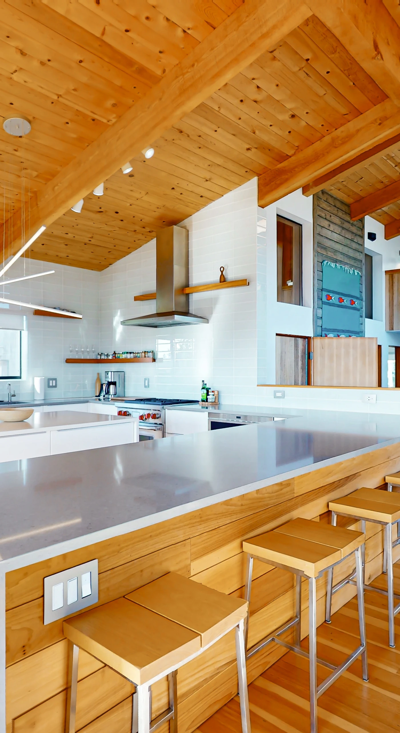 Craft your favorite meals in this spacious kitchen, where the ocean view inspires culinary creativity and shared moments.