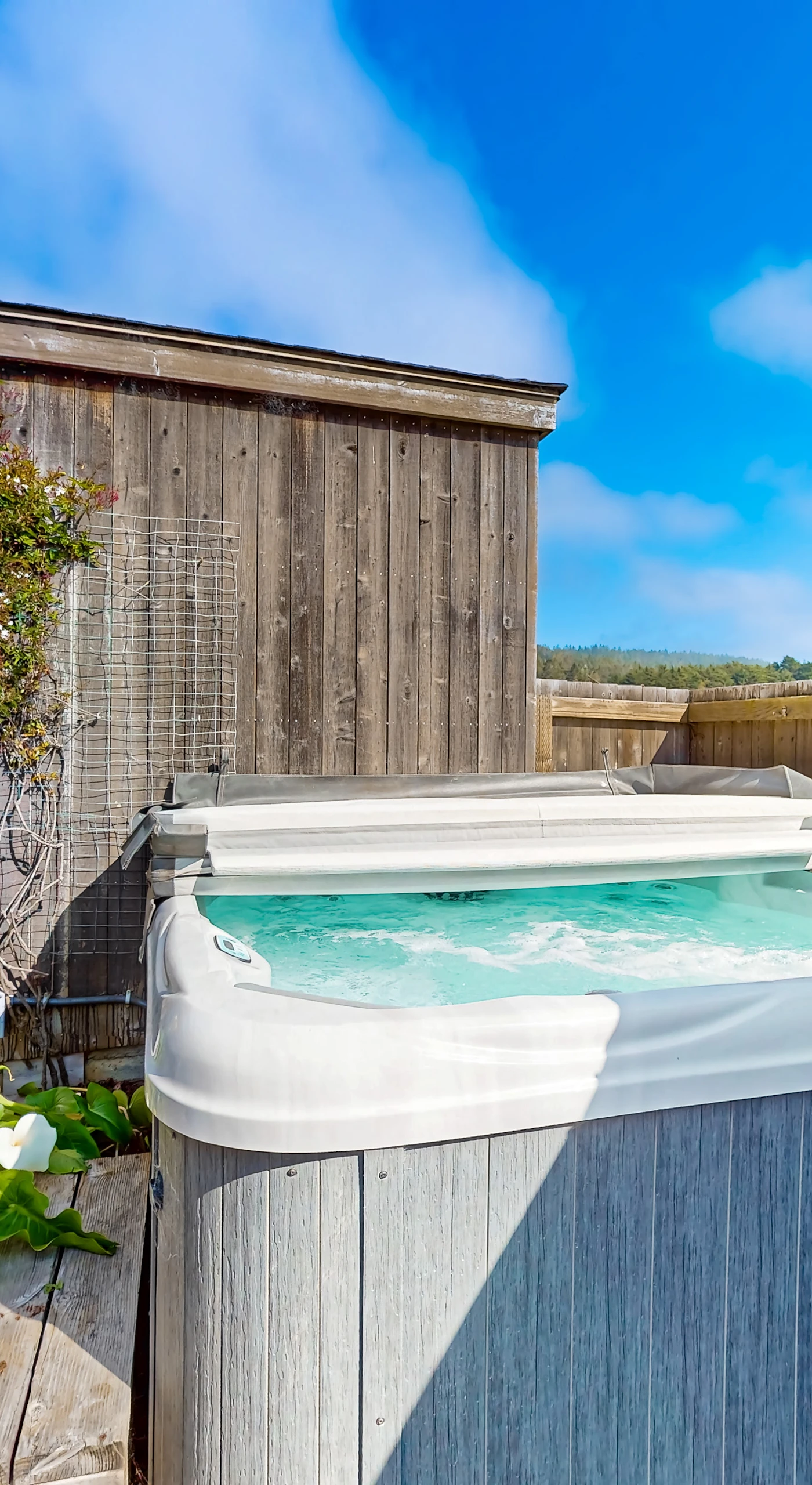 Soak away your cares in the private hot tub, surrounded by nature, perfect for stargazing after a day of exploration.