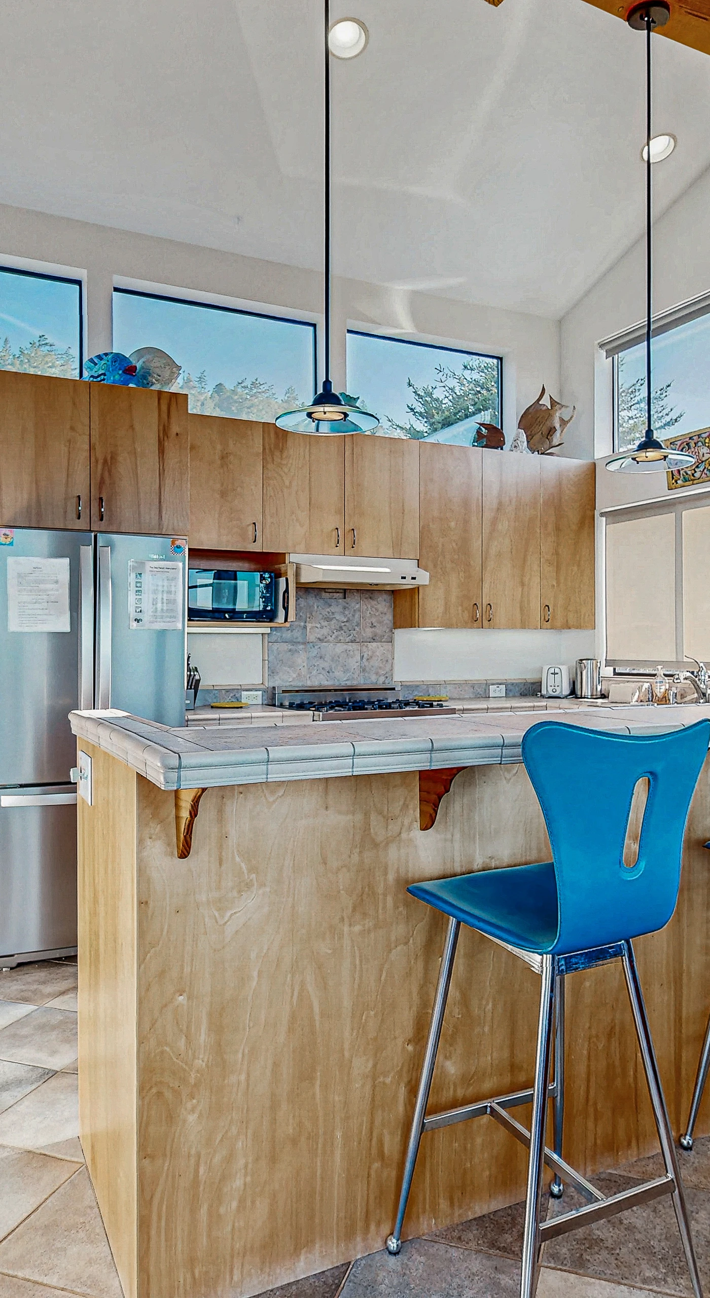 Unleash your culinary creativity in the well-equipped kitchen, designed for both cooking and entertaining.
