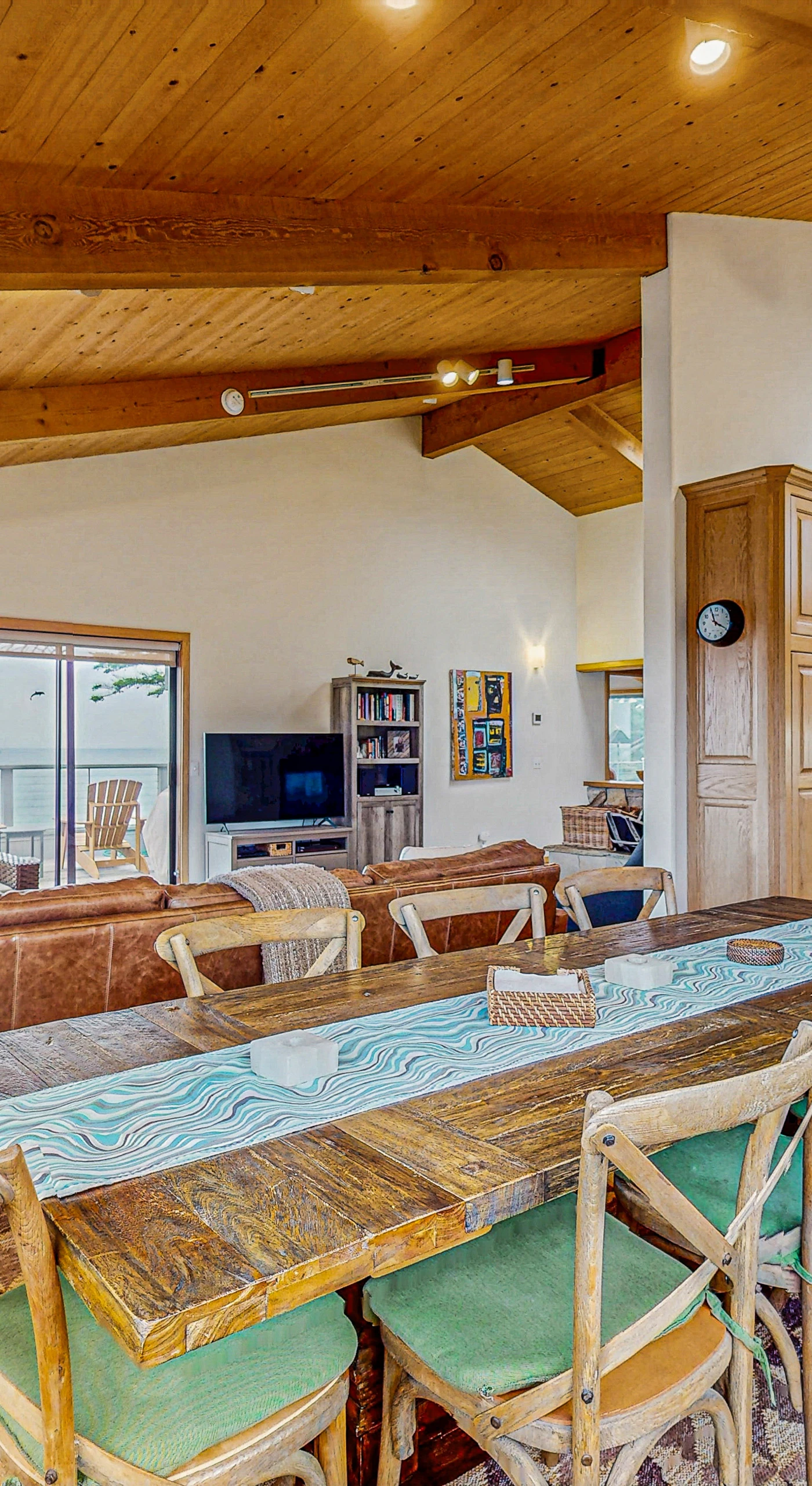 The open-concept living area blends comfort and style, inviting you to relax and enjoy the beauty of your surroundings.