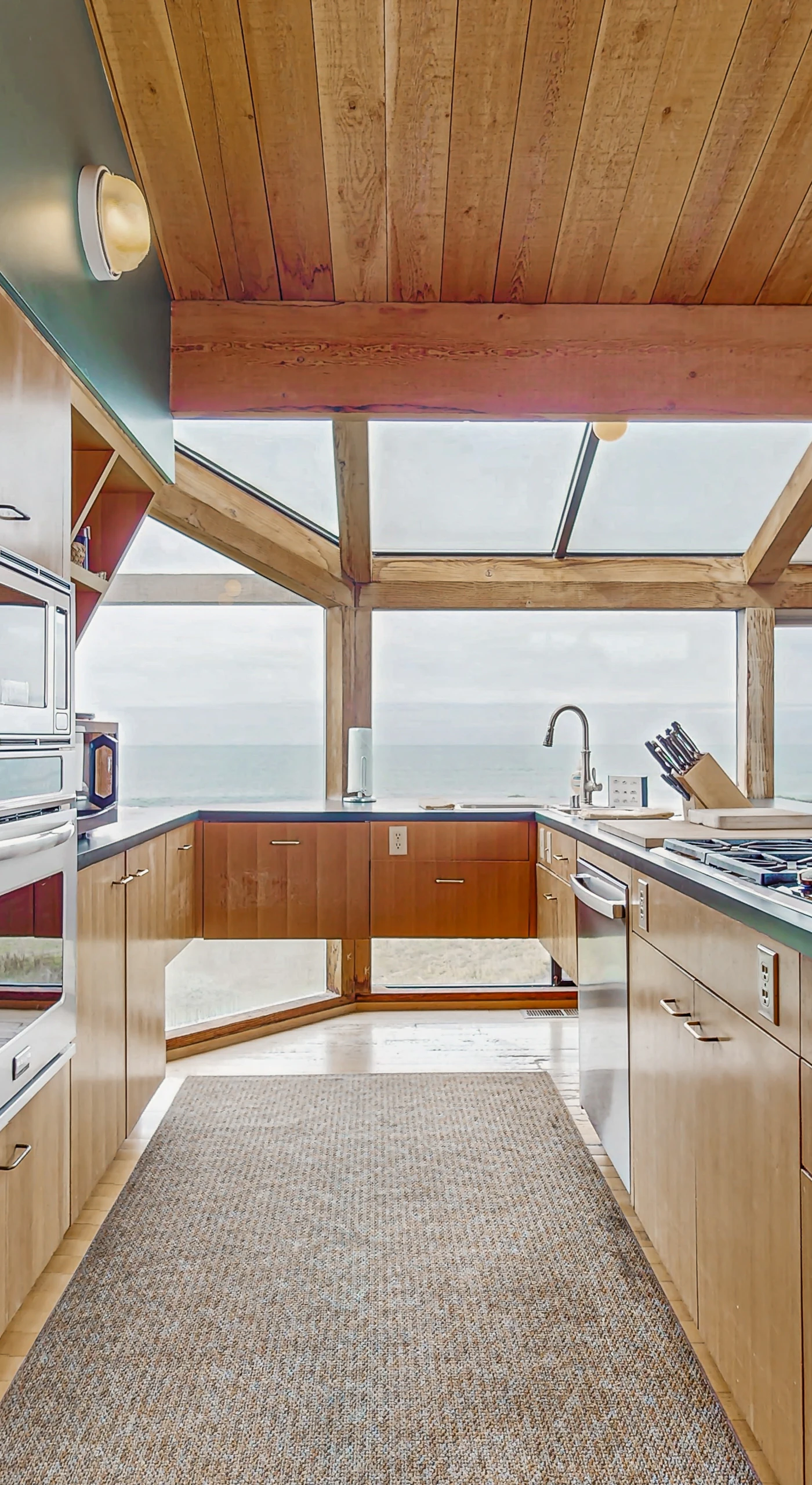 Cook your favorite meals in this modern kitchen, complete with breathtaking views that inspire culinary creativity.
