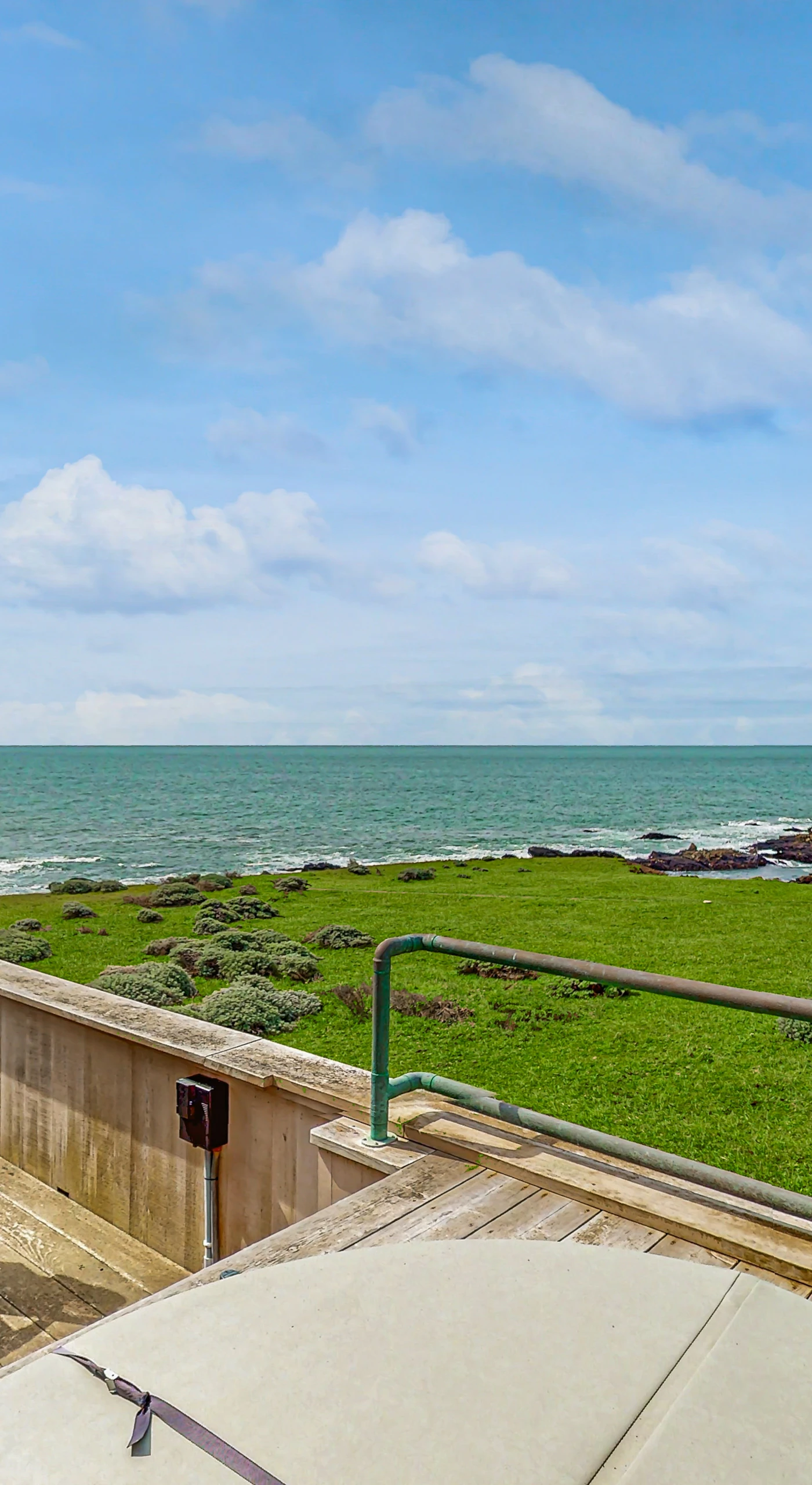 Step onto the deck to savor the fresh coastal air and panoramic ocean views—your private retreat awaits.