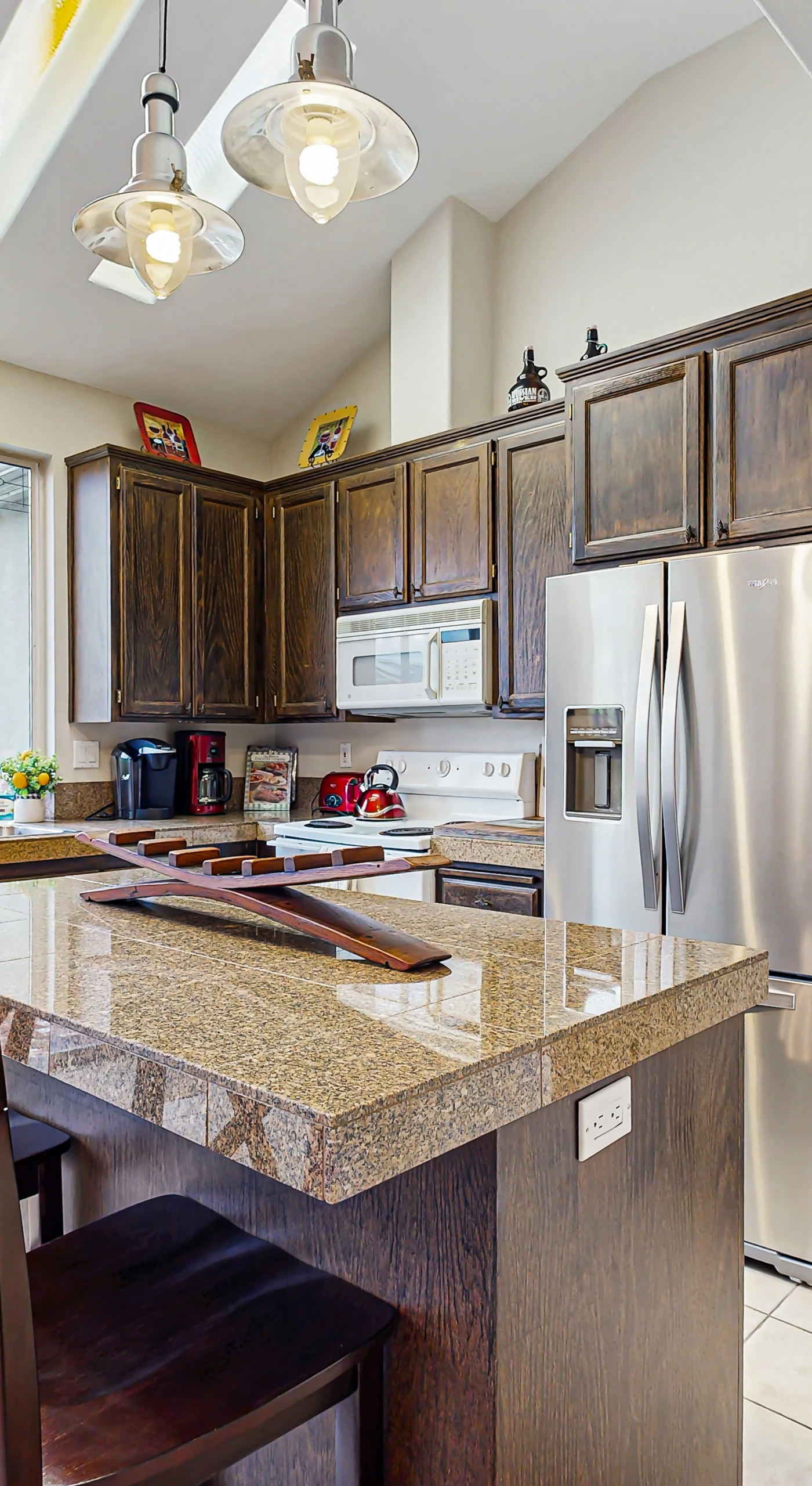 Brew your morning cup in a fully equipped kitchen with granite countertops, a breakfast bar, and stainless steel appliances — everything you need to cook with local Sonoma ingredients.