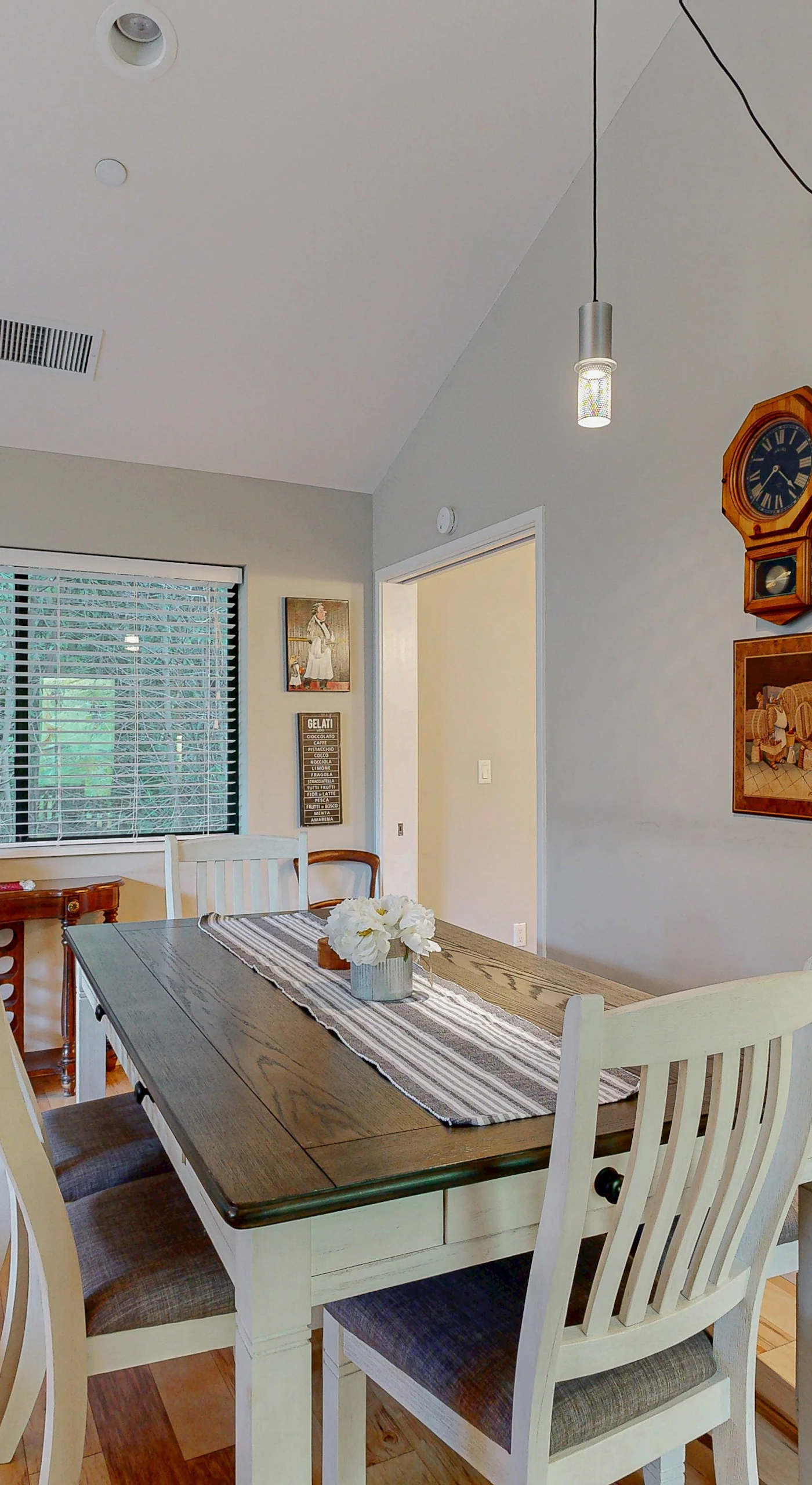 Enjoy farm-to-table meals at the elegant dining table, perfectly positioned for your wine country dinner party.