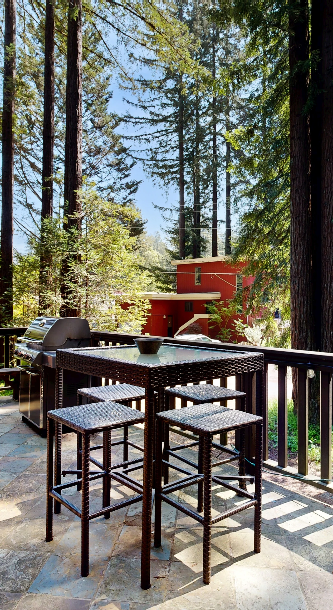 Gather around your high-top deck table for al fresco lunches with redwood canopy views — the BBQ grill stands ready for your Sonoma County farmers' market finds.