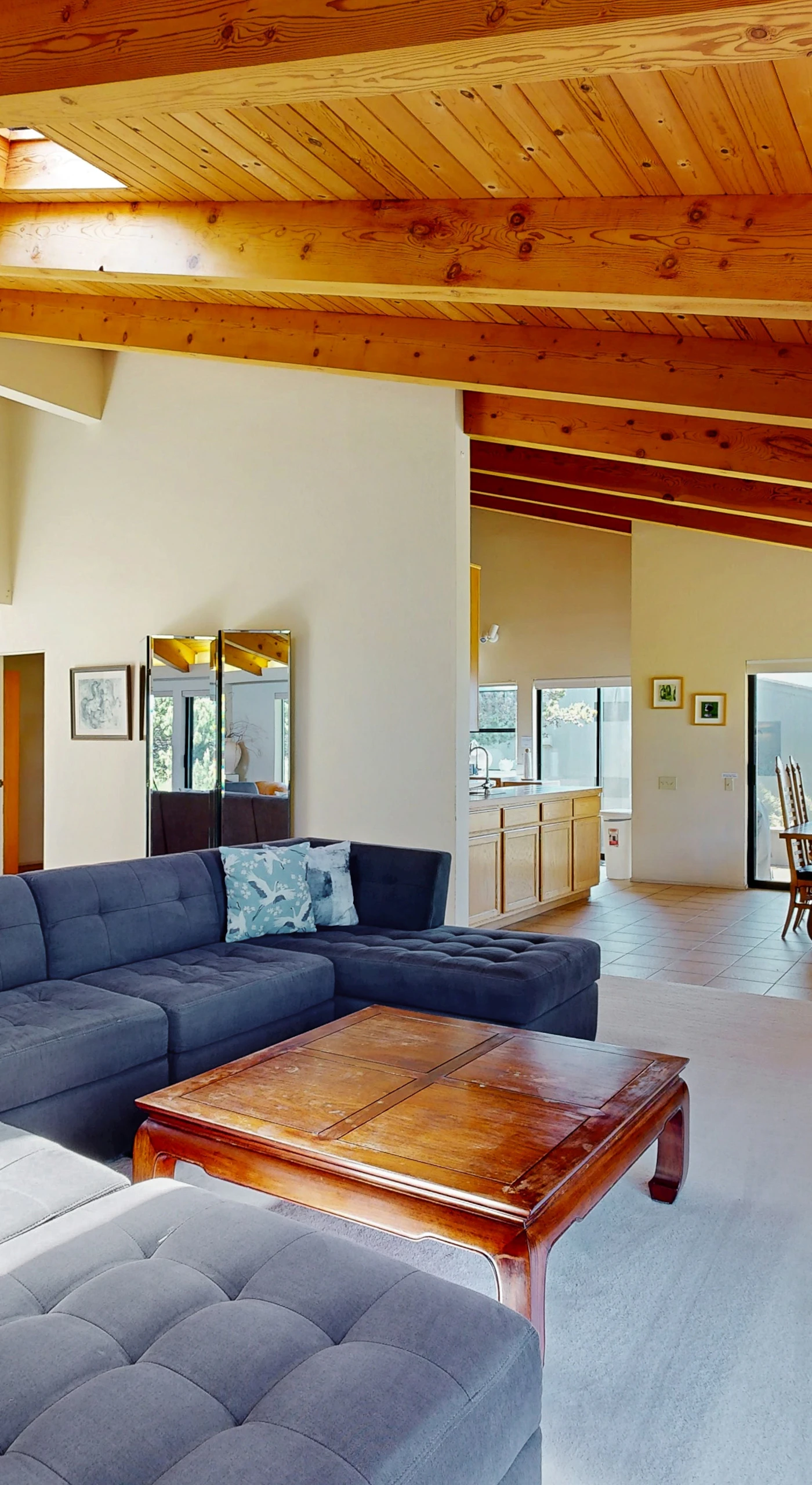 Morning light fills the spacious living room, inviting you to relax and enjoy ocean views from every angle.
