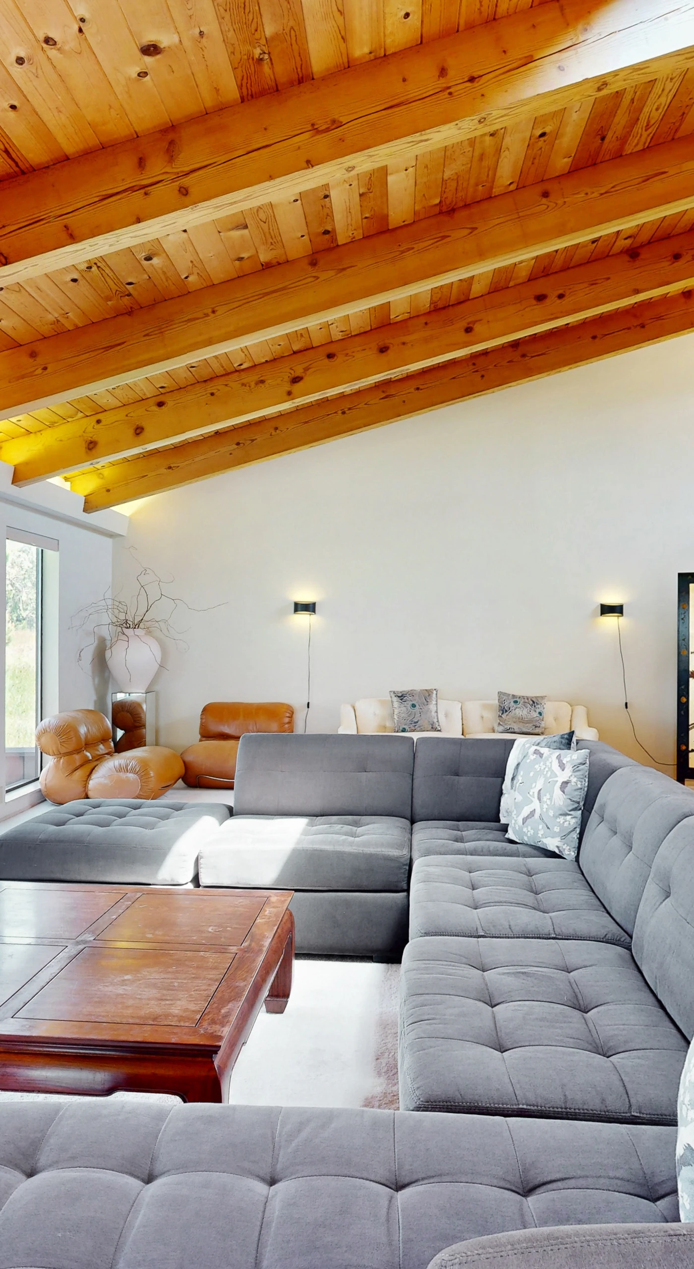 Gather your loved ones in this cozy living room, perfect for game nights or watching the sunset together.