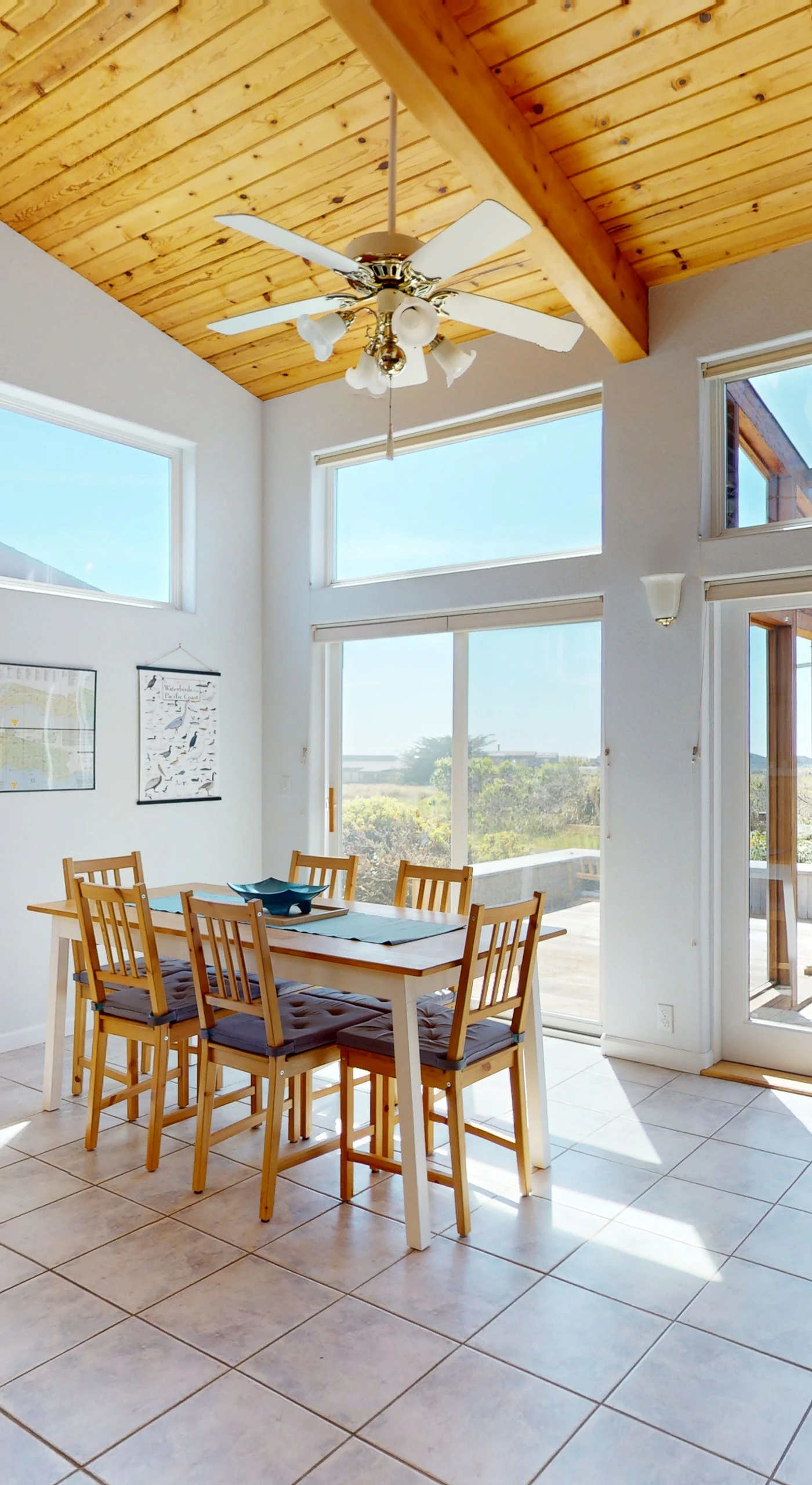 Dine with a view—enjoy meals bathed in sunlight in the inviting dining area, connecting you to the outdoor beauty.