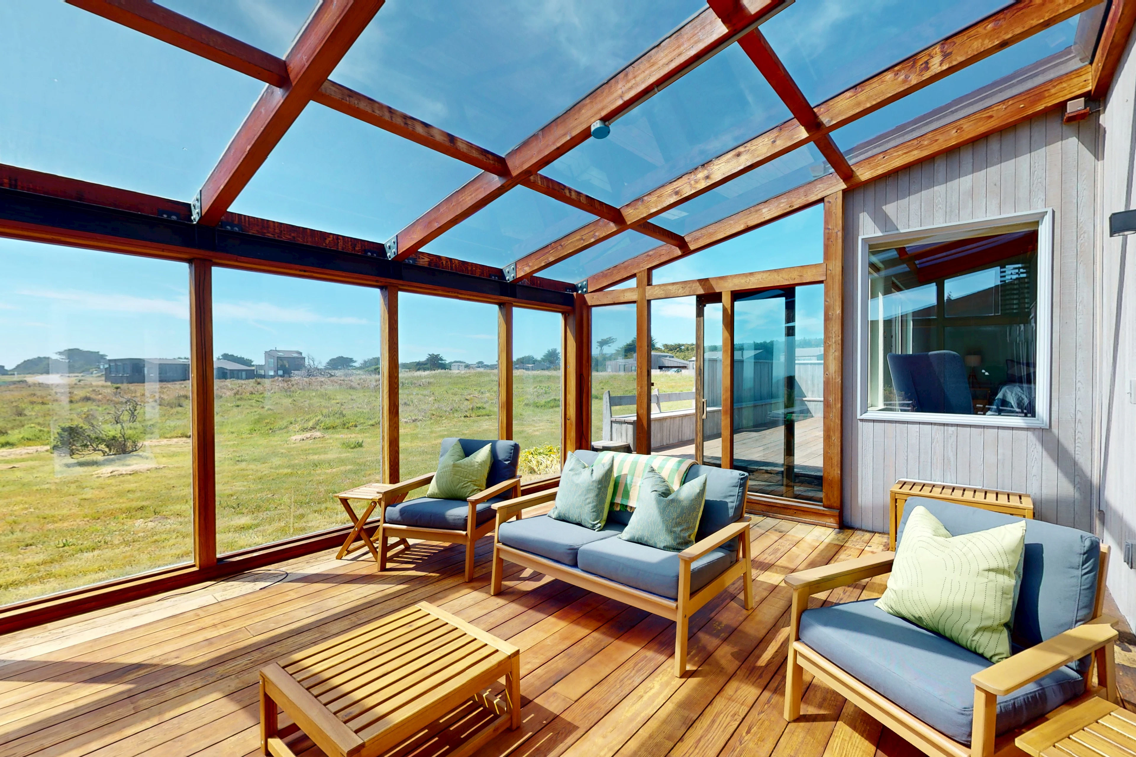 Step onto the sunlit deck, where ocean breezes and stunning vistas invite you to relax with your favorite drink.