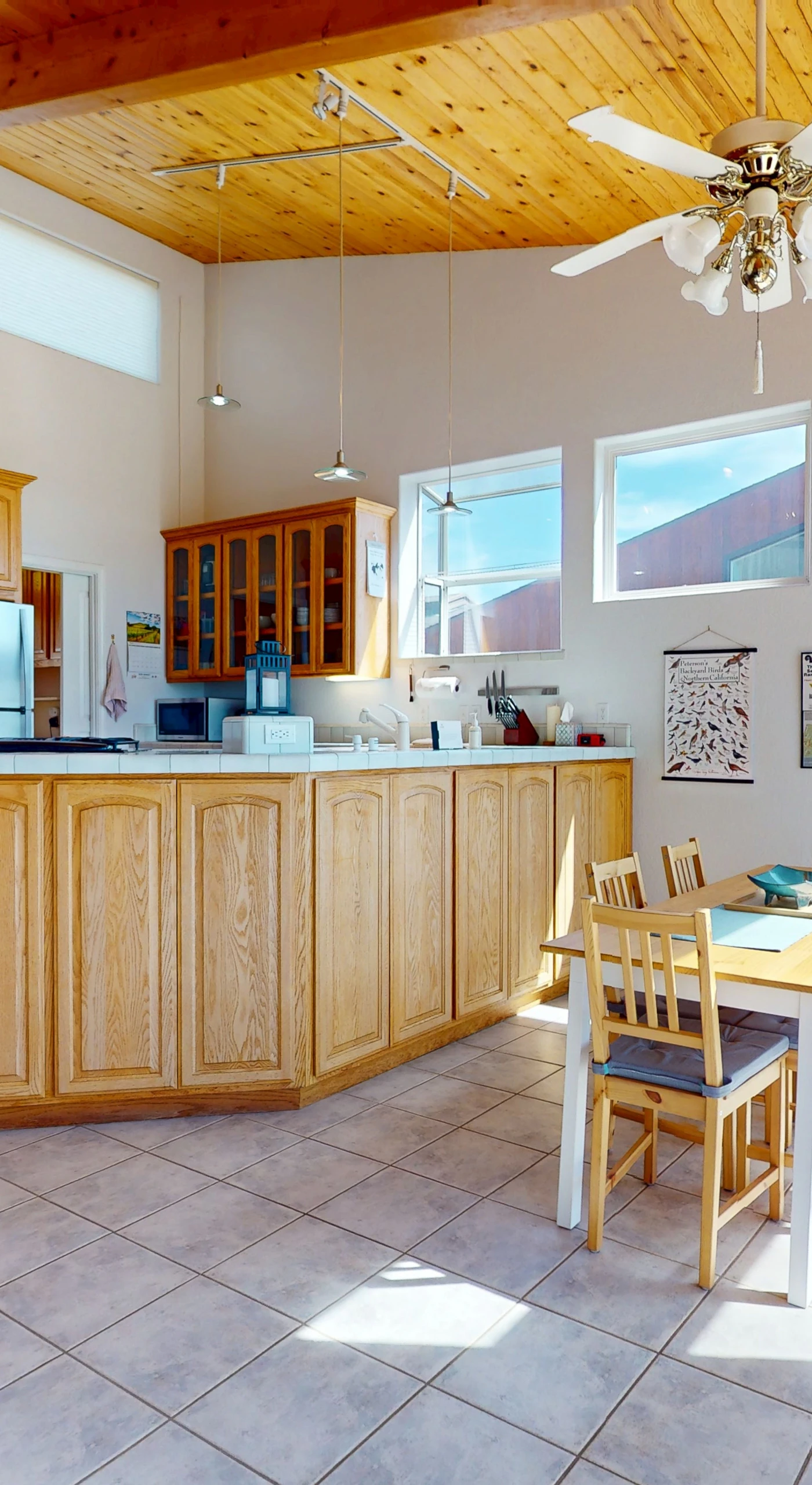 Craft culinary delights in the open kitchen, where ample space and natural light inspire your inner chef.