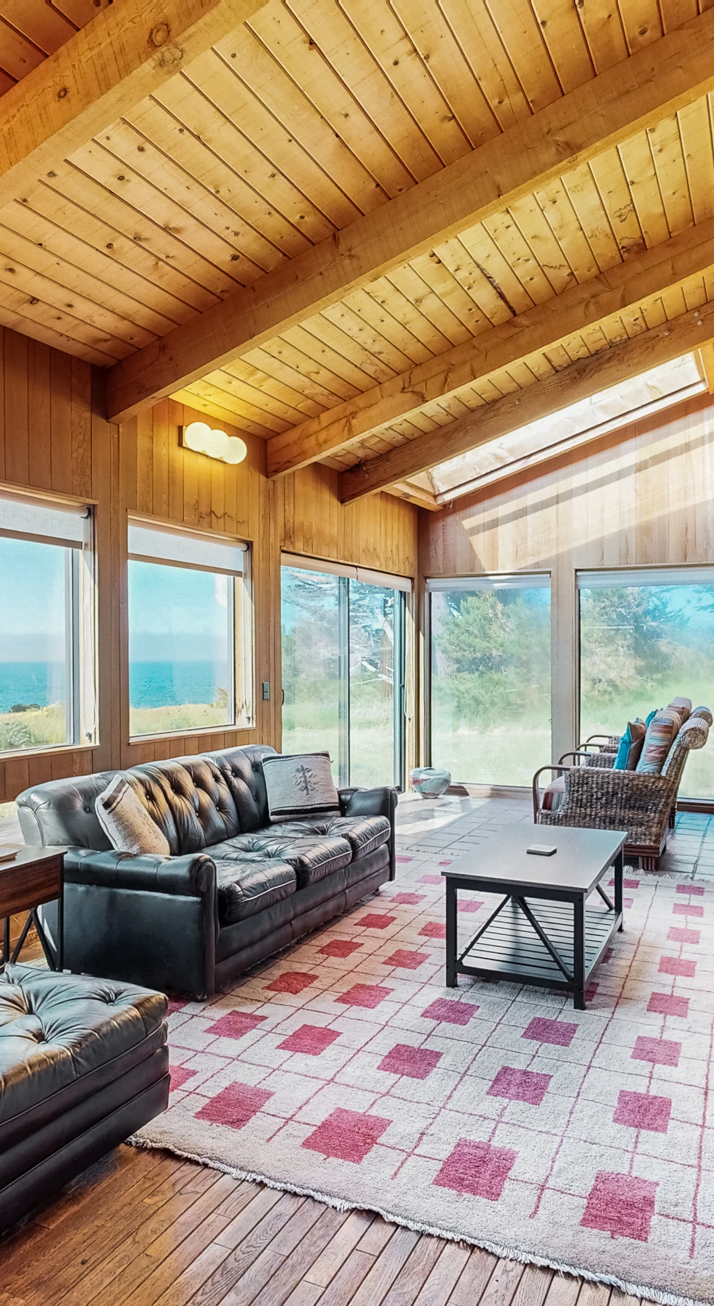 Morning light fills the spacious living room, where you can enjoy panoramic views and cozy gatherings with loved ones.