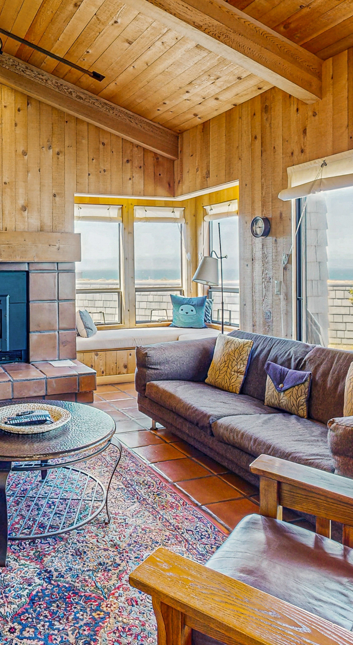 Gather around the cozy gas fireplace in the living room, where panoramic views invite relaxation and connection with loved ones.