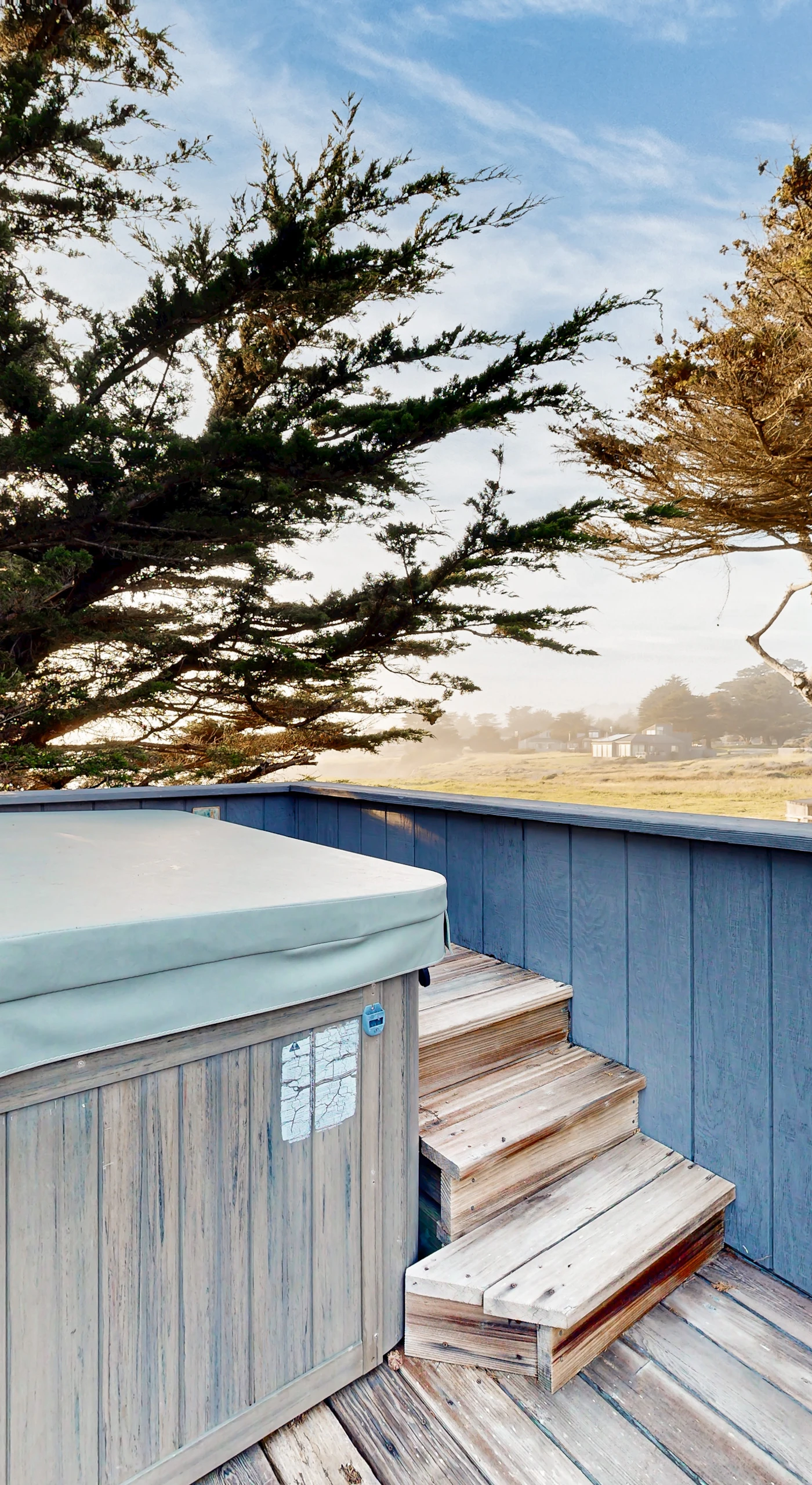 Slip into the soothing waters of your private hot tub, surrounded by the serene sounds of nature and the gentle ocean breeze.