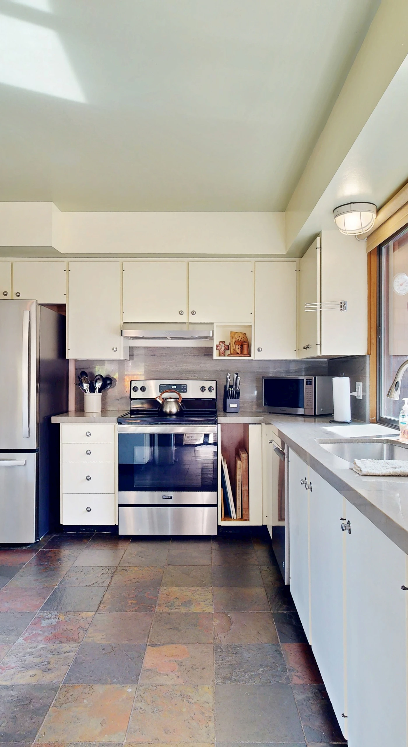Cook up your favorite meals in the modern kitchen, equipped with everything you need to create culinary delights while enjoying ocean views.