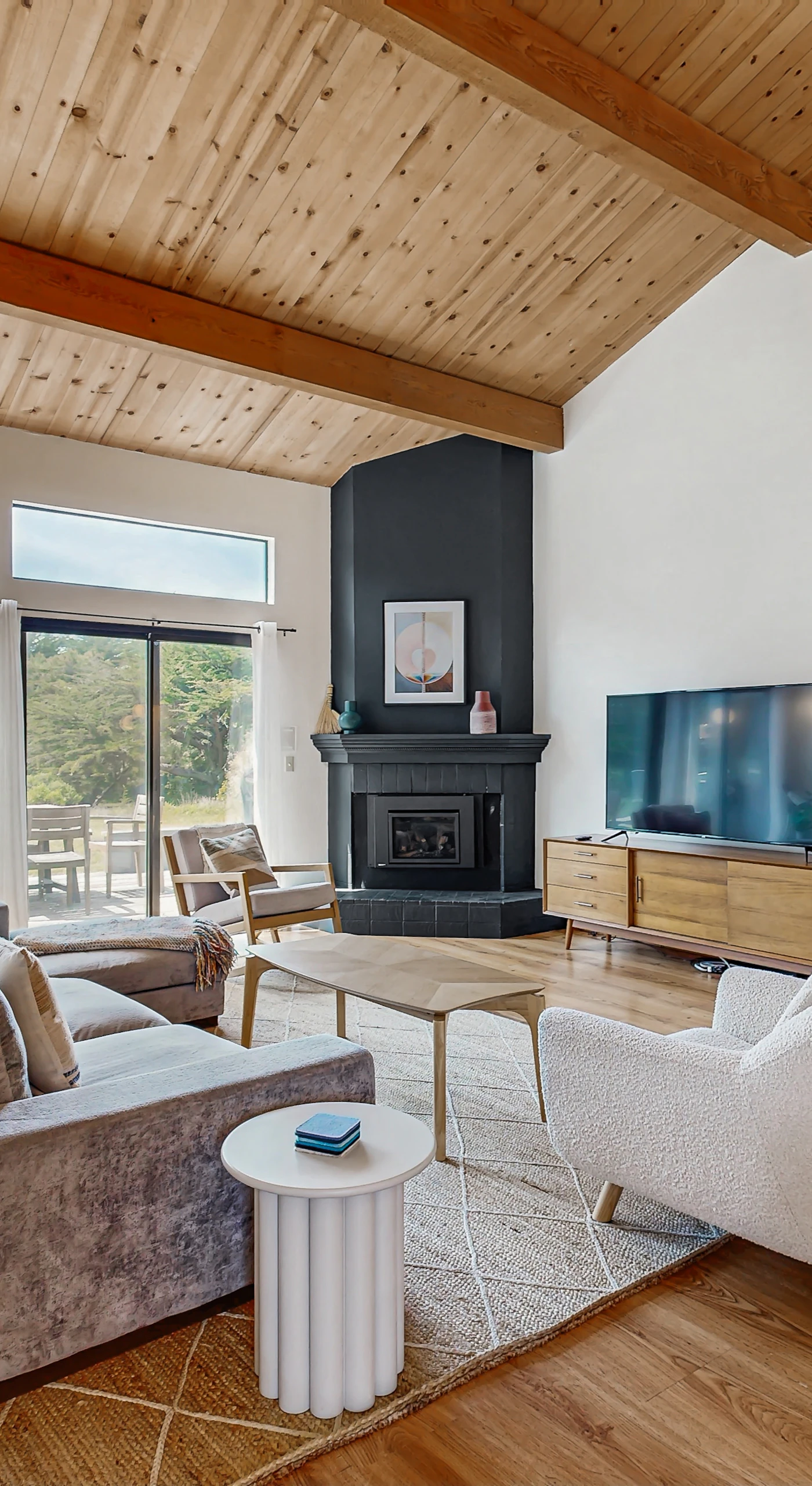 Gather around the gas fireplace in the cozy living room, perfect for unwinding after a day of adventure.