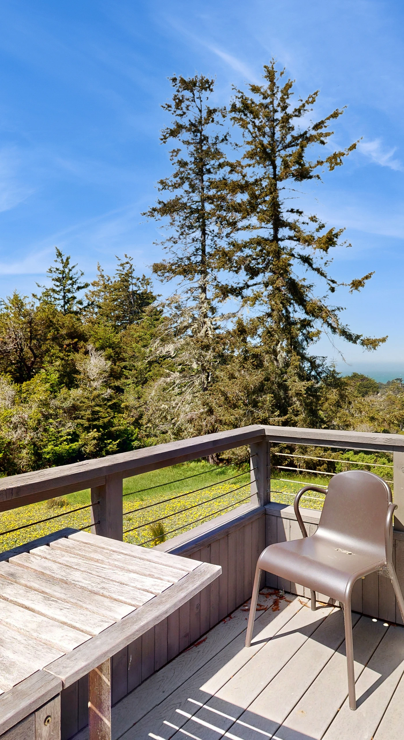 The inviting deck area is perfect for al fresco dining or simply enjoying the tranquility of nature, creating lasting memories with family and friends.