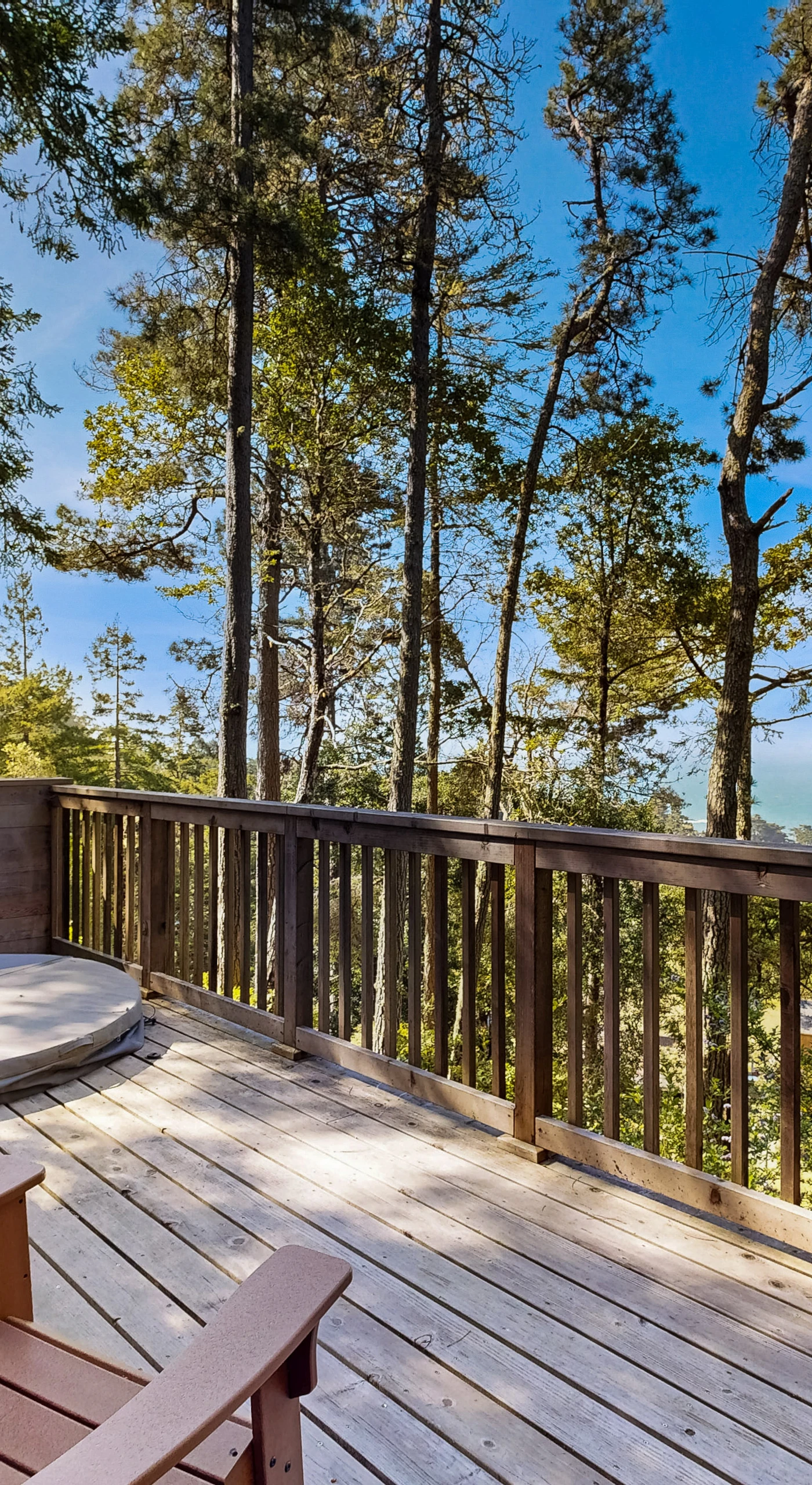 Friends can gather on the outdoor deck, where you can soak in the hot tub or simply take in the breathtaking coastal views.
