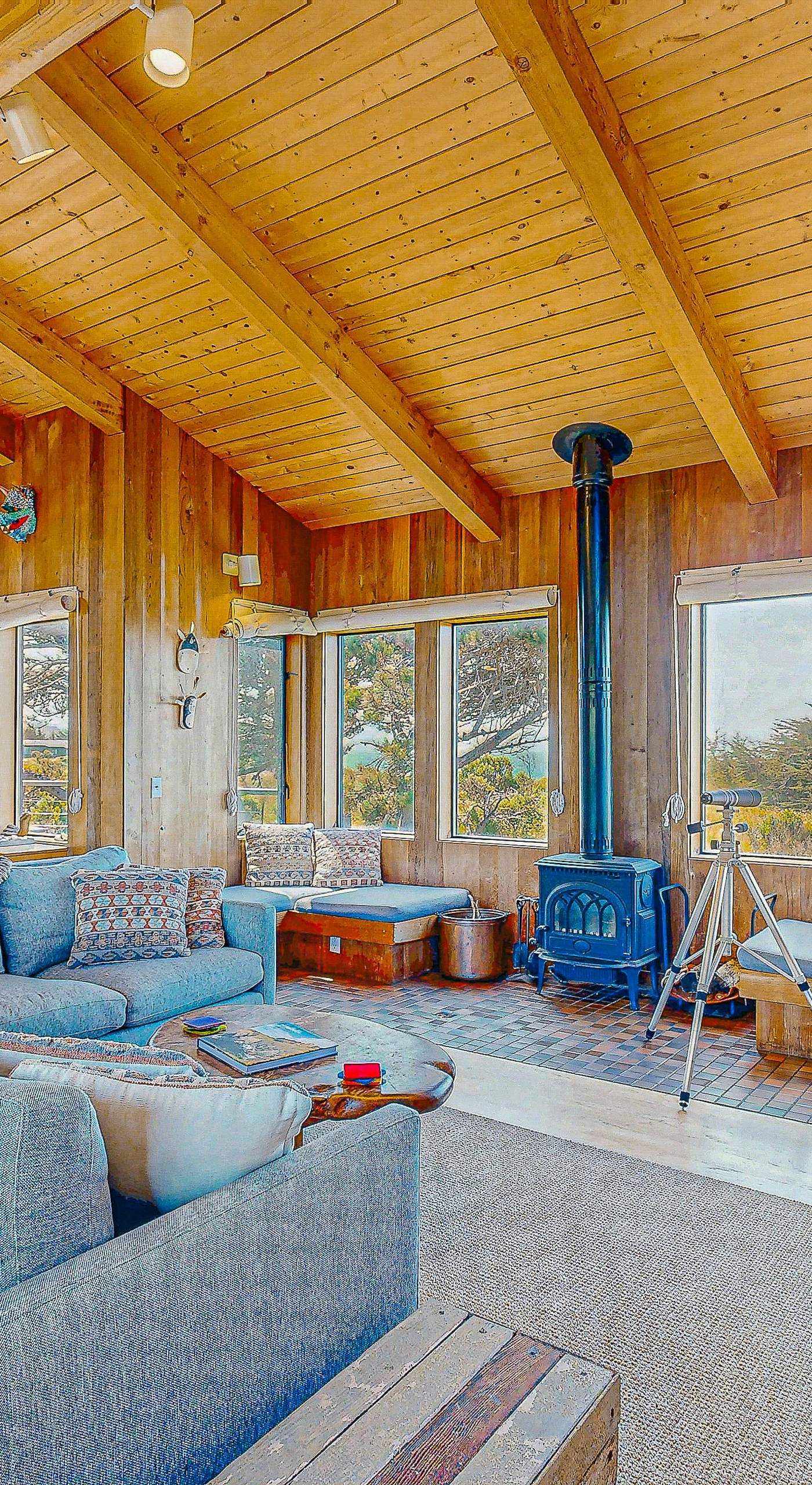 Morning light fills the living room, inviting you to unwind with a book or enjoy the company of loved ones.