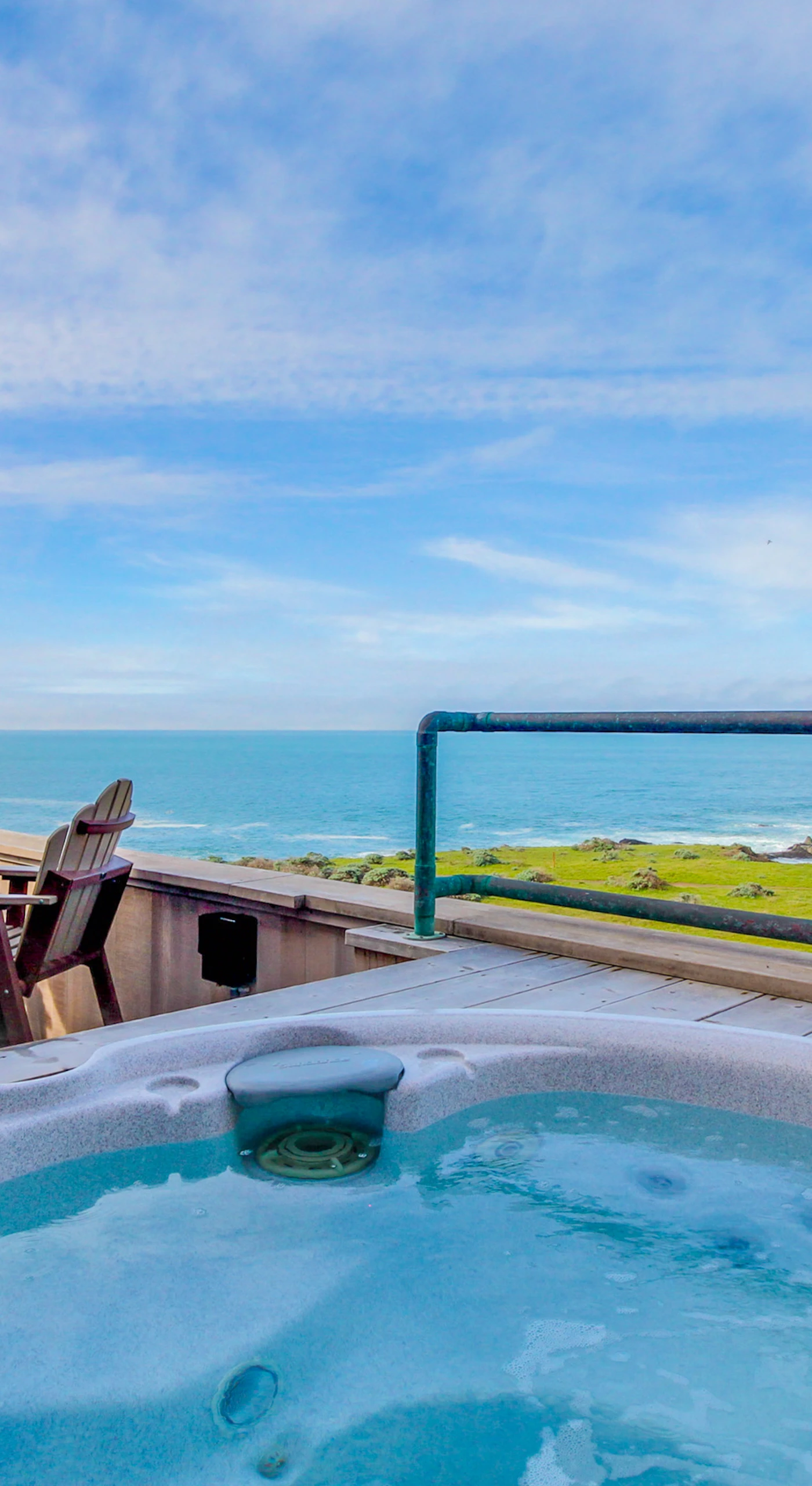 Soak in the private hot tub as you gaze at the endless ocean views—perfect for stargazing after sunset.