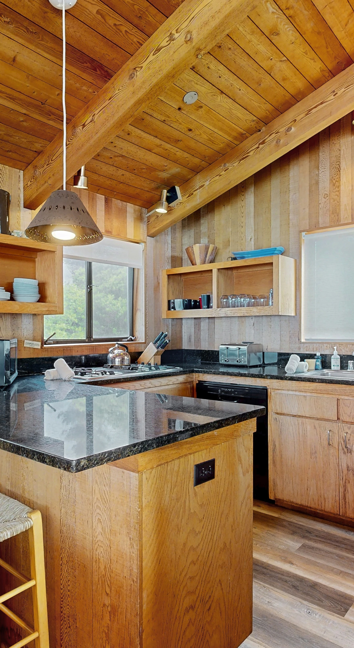 Craft culinary delights in this well-appointed kitchen, featuring modern appliances and ample counter space for your favorite recipes.
