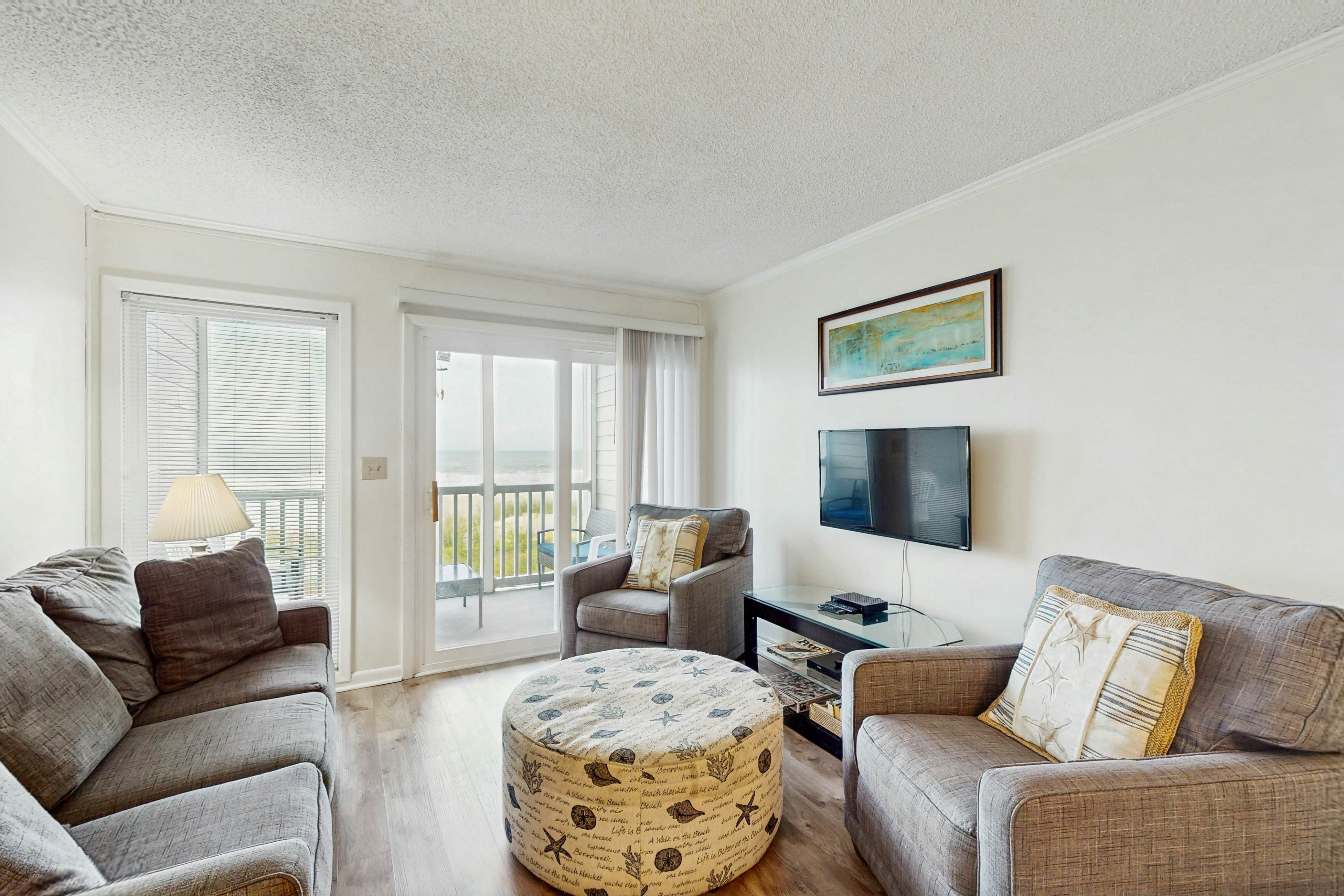 Pelicans Watch 106 On the Beach