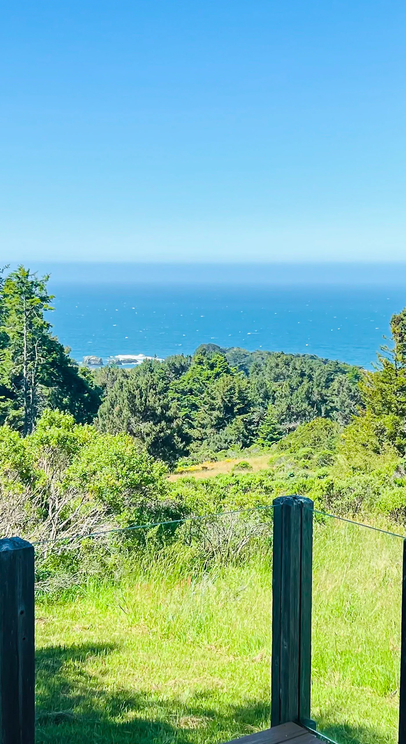 Gaze out toward the horizon from your private oasis, surrounded by lush greenery and the calming sounds of the ocean.