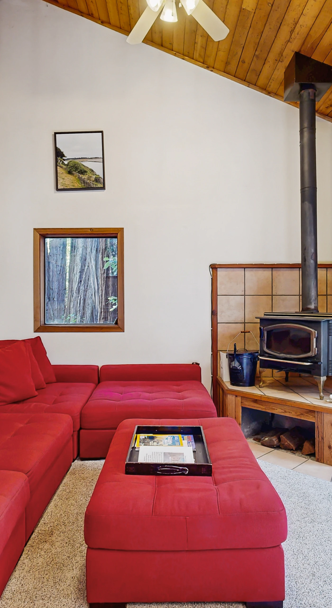 Gather around the cozy wood-burning fireplace in the living room, perfect for sharing stories after a day of adventures.
