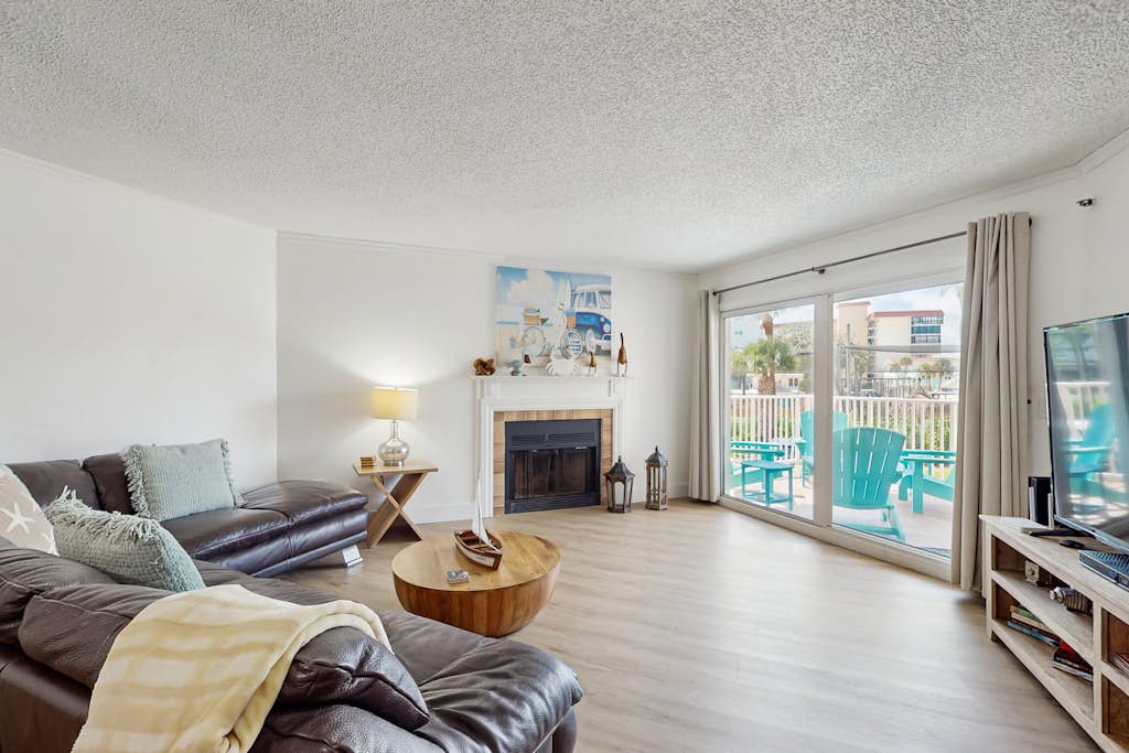 Modern cottage with peek a boo side Gulf view and beachfront heated pool and spa — Indian Shores, FL — vacation rental
