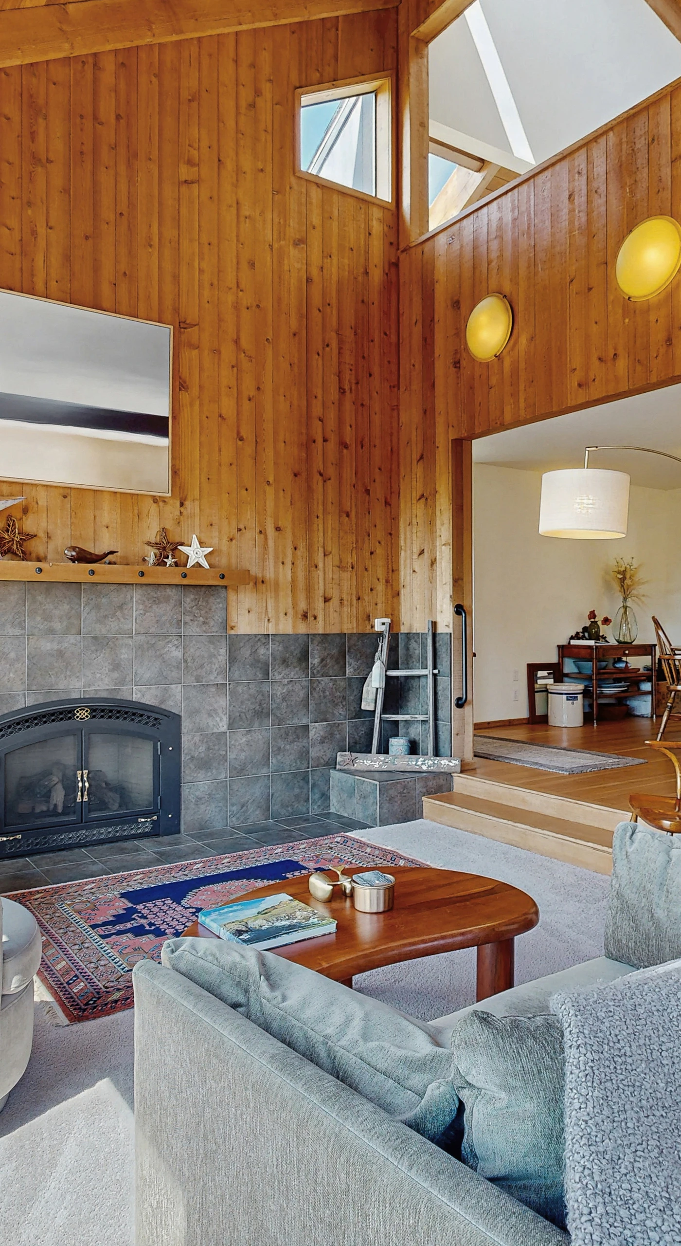 Gather around the cozy gas fireplace in the living room, a perfect setting for evening chats and movie nights.