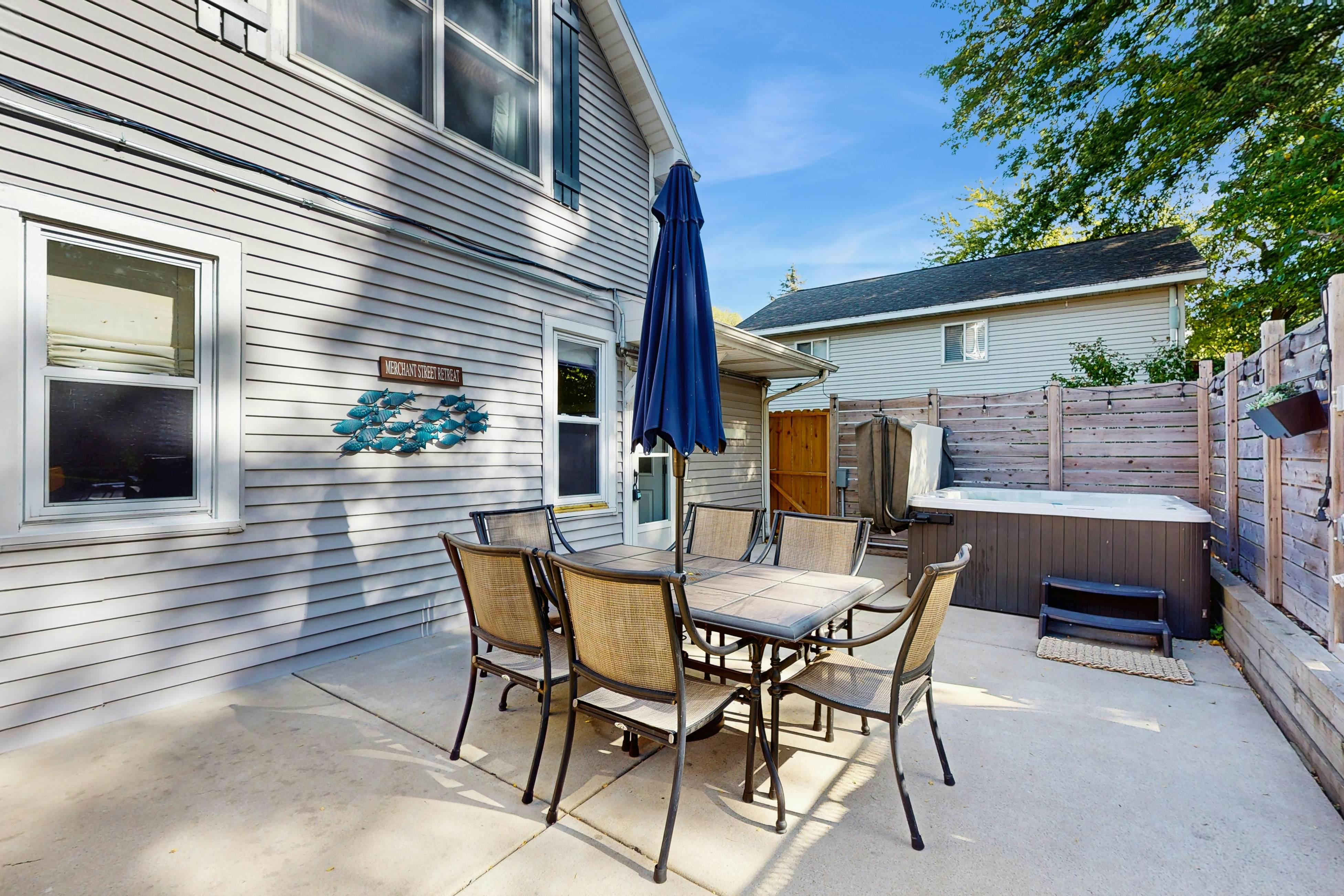Merchant Street Pool Retreat with a  Year-Round Hot Tub.