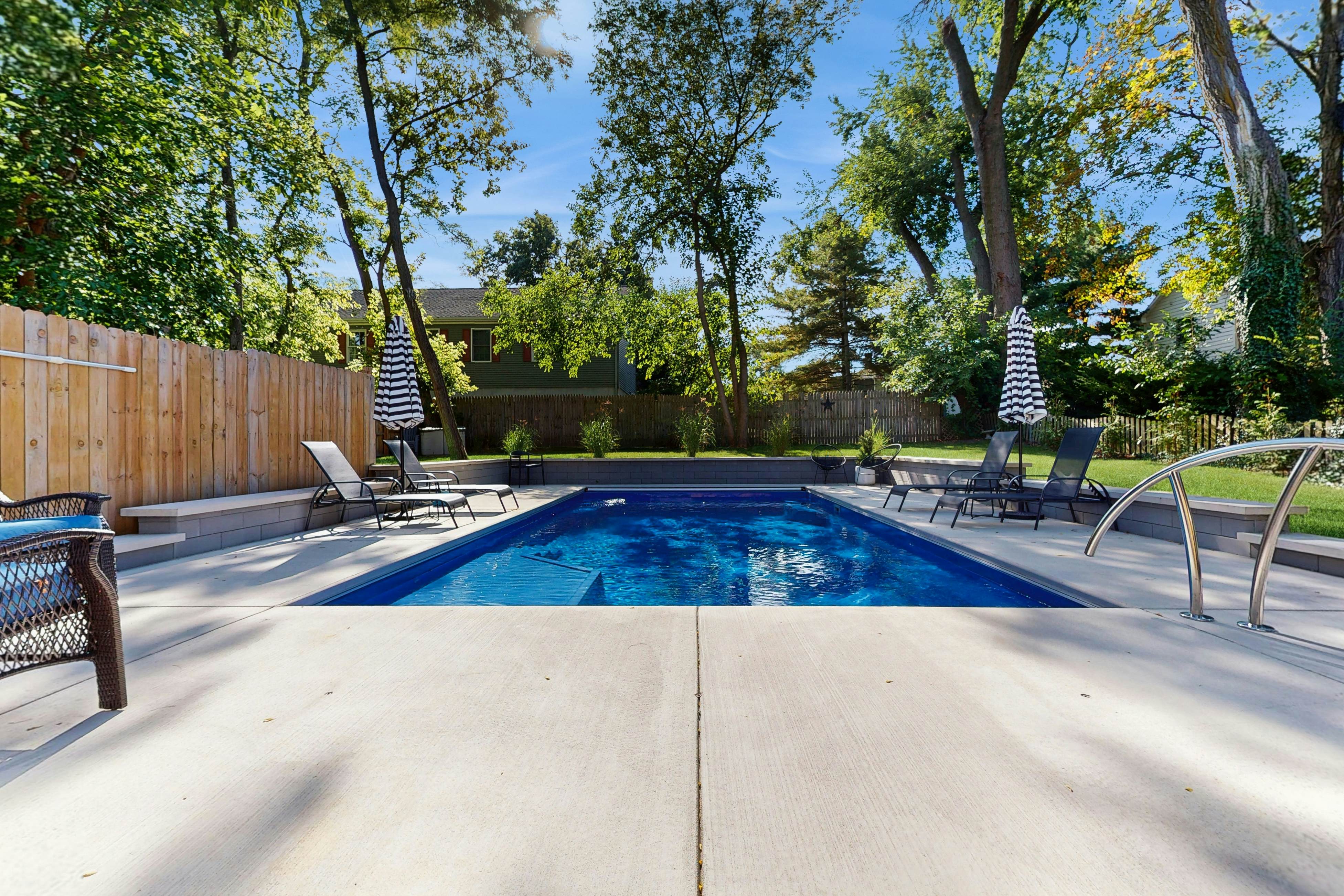 Merchant Street Pool Retreat with a  Year-Round Hot Tub.