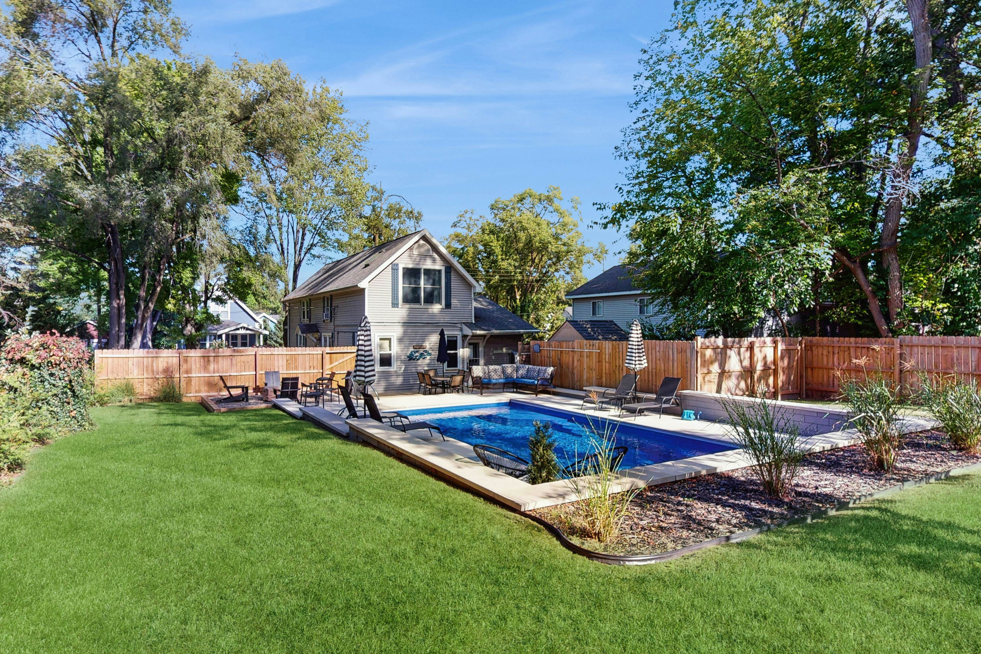 Merchant Street Pool Retreat with a  Year-Round Hot Tub.