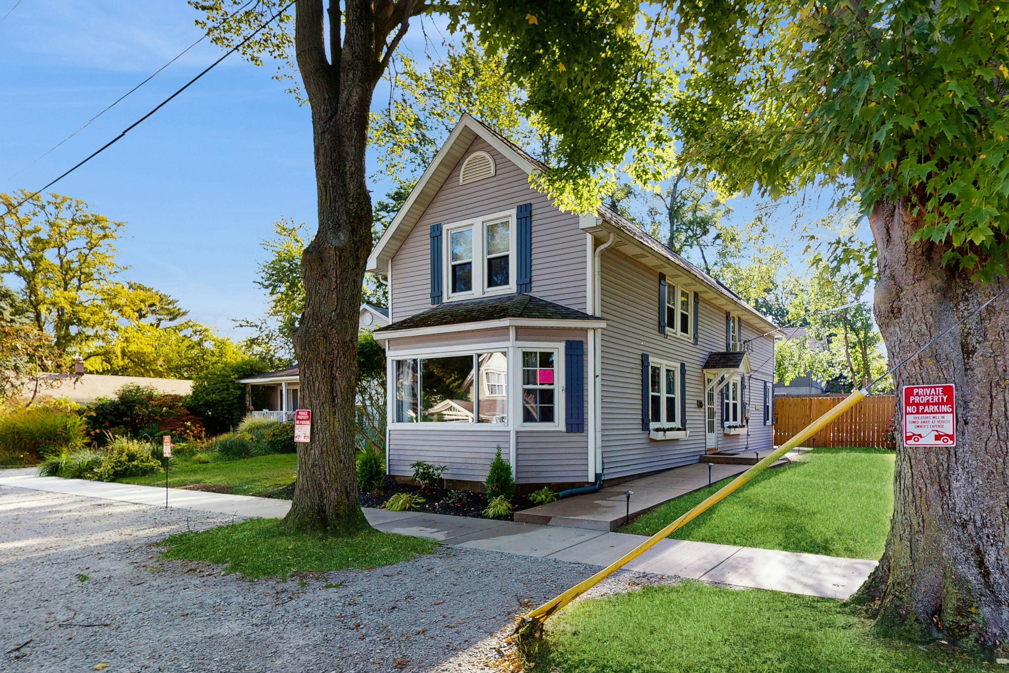 Merchant Street Pool Retreat with a  Year-Round Hot Tub.