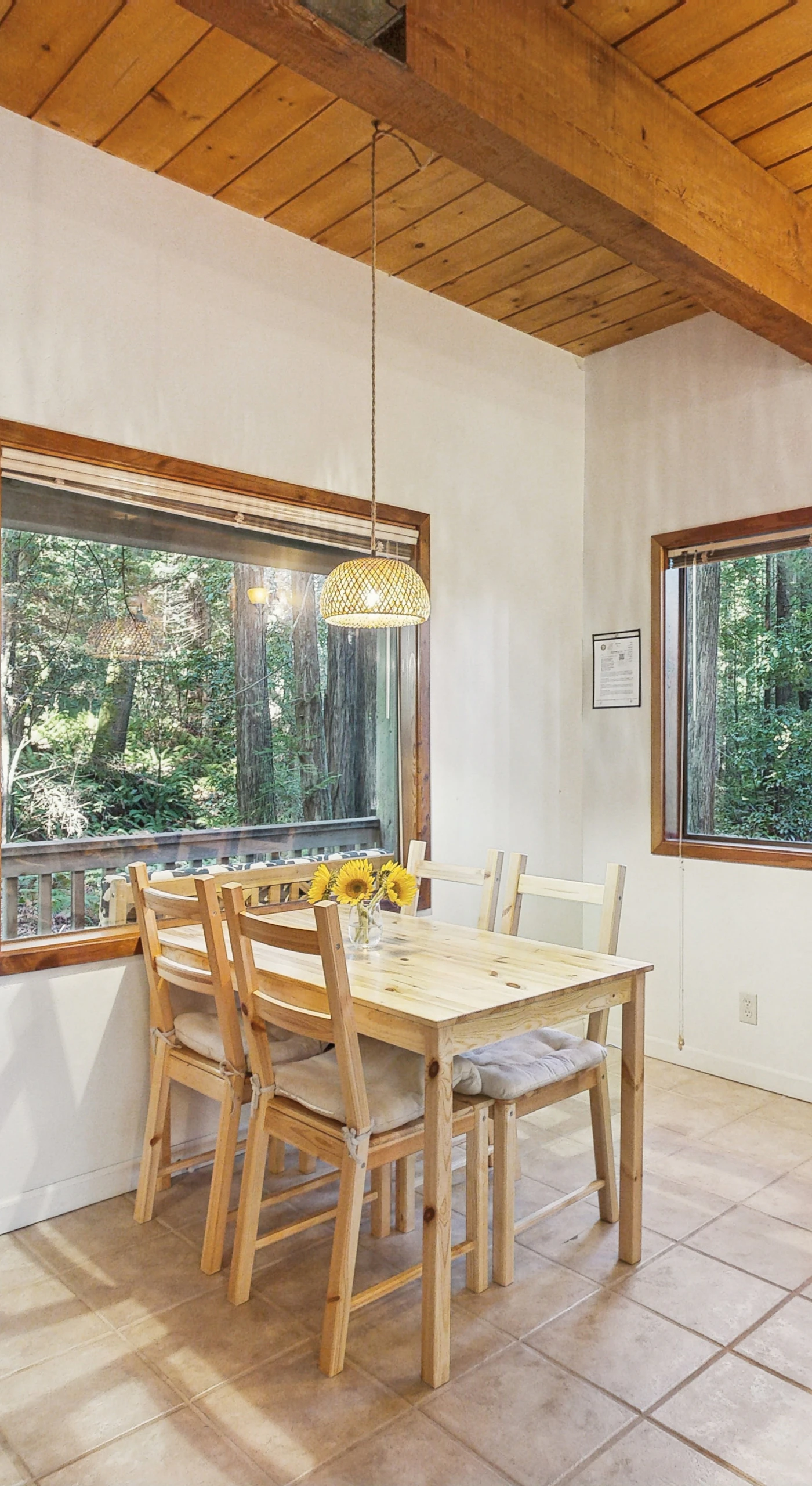 Share meals and memories at this dining table, where forest views enhance your dining experience, making every meal special.