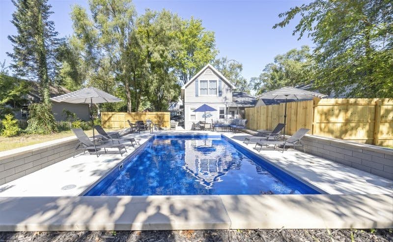 Merchant Street Pool Retreat with a  Year-Round Hot Tub.