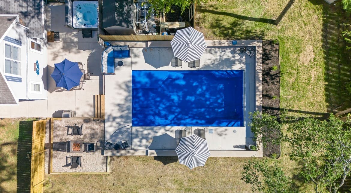 Merchant Street Pool Retreat with a  Year-Round Hot Tub.