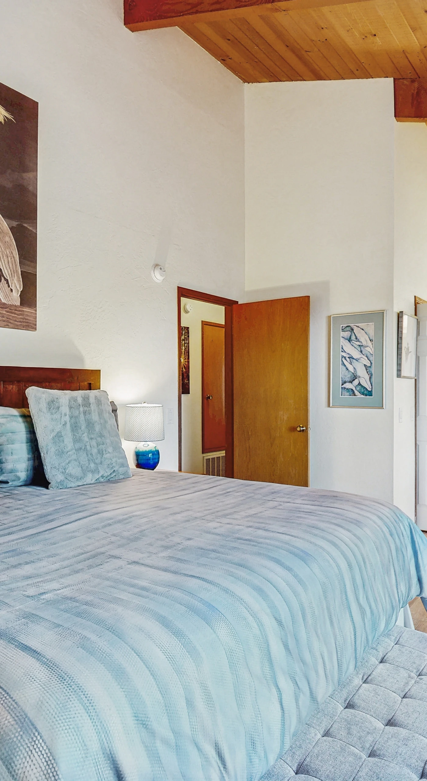 Retreat to the master bedroom, where a tranquil atmosphere and plush bedding promise restful nights and rejuvenating mornings.