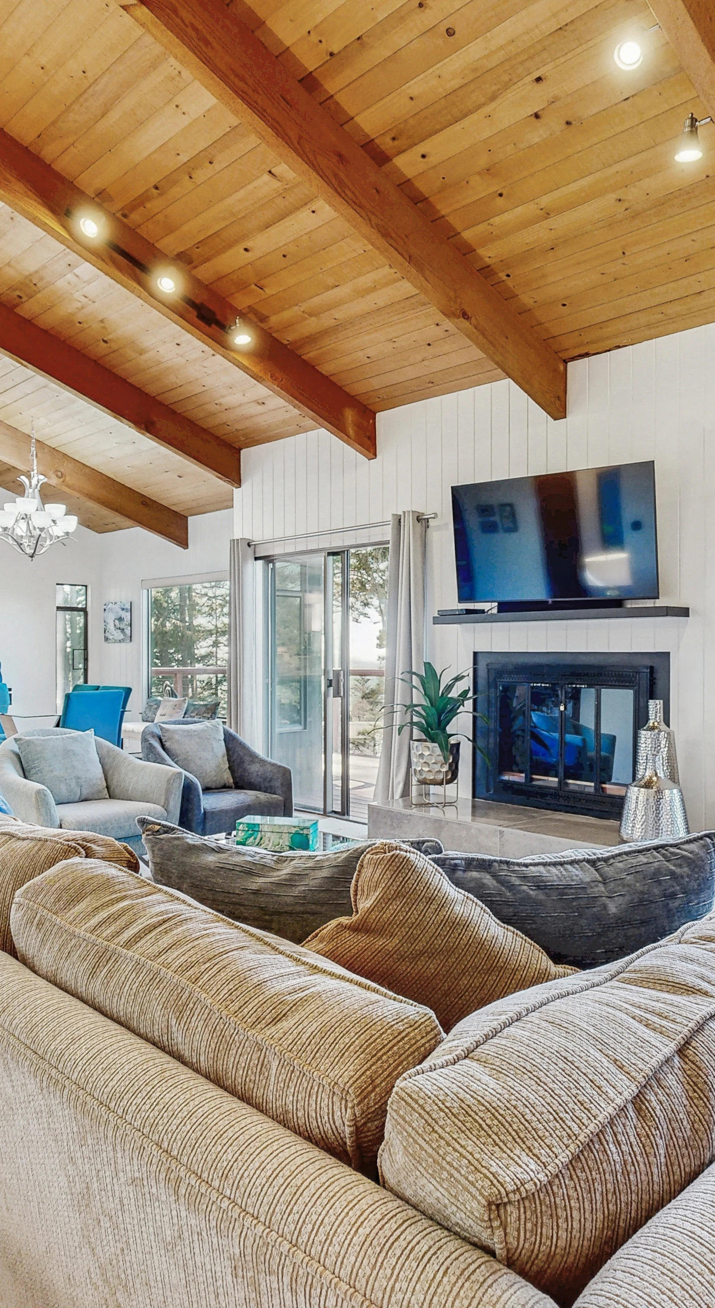 Gather around the spacious seating area, where you can catch up on your favorite shows or enjoy a cozy movie night.