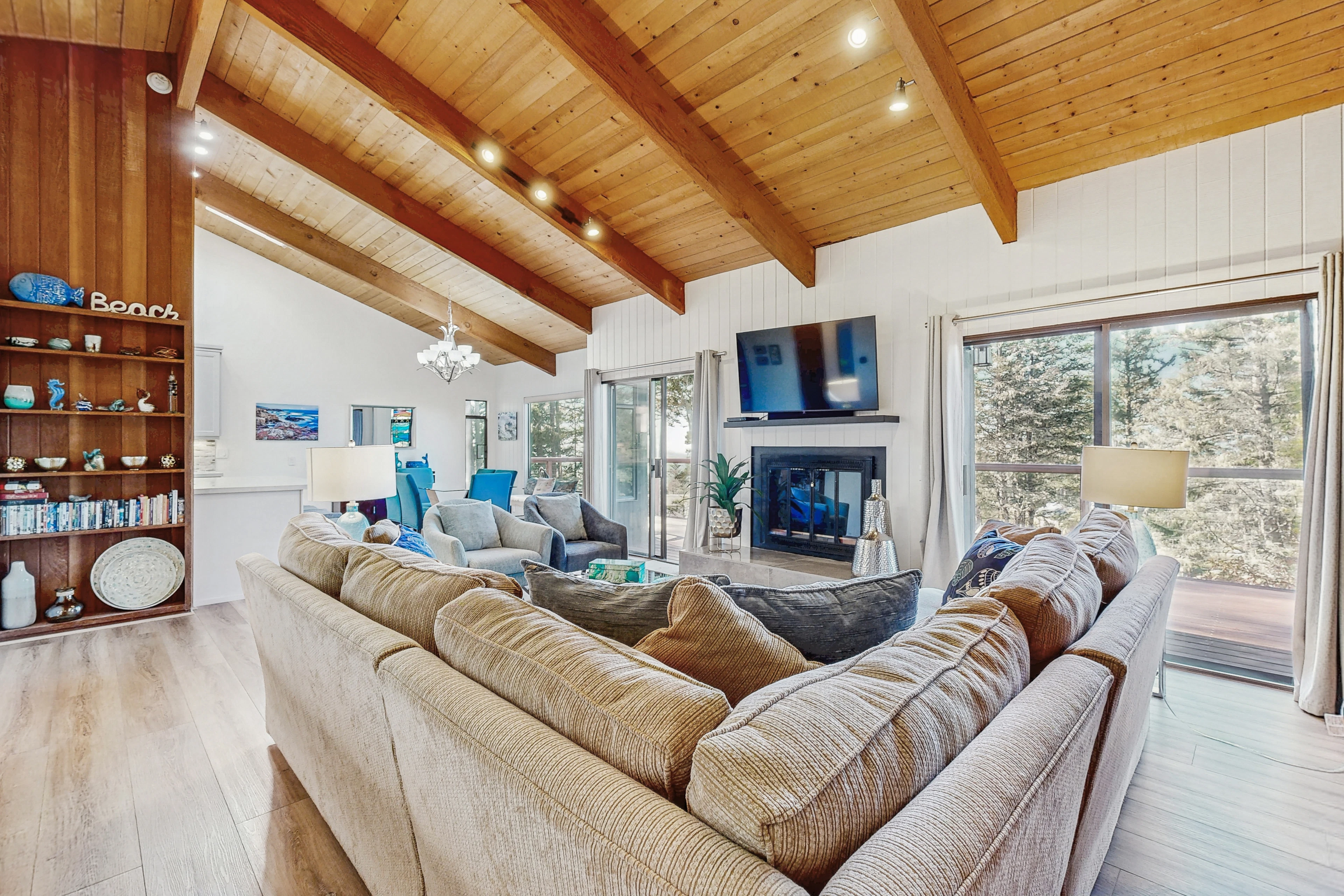 Gather around the spacious seating area, where you can catch up on your favorite shows or enjoy a cozy movie night.