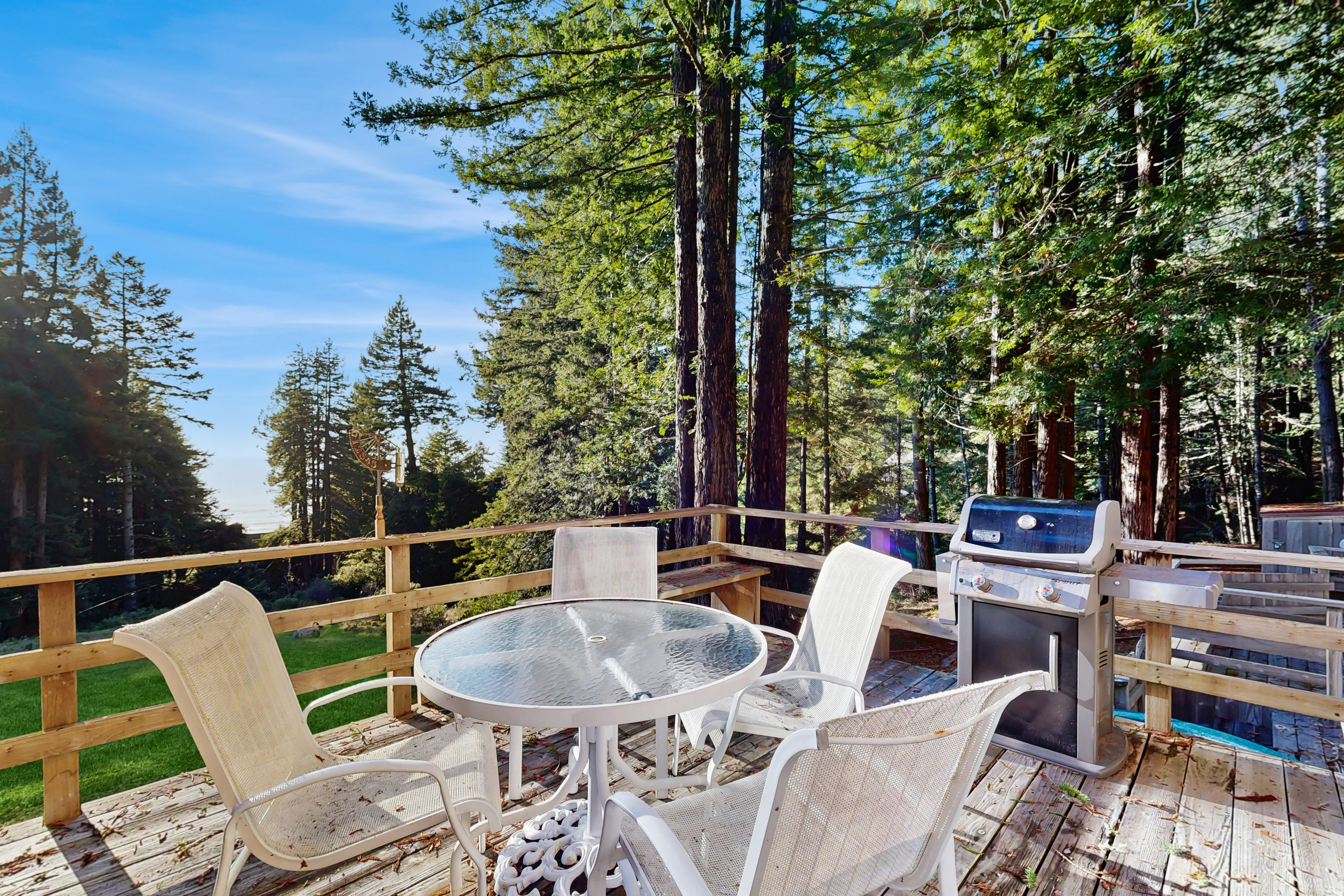 Host barbecues or simply soak in the sun on this spacious deck, offering a seamless blend of indoor and outdoor living.