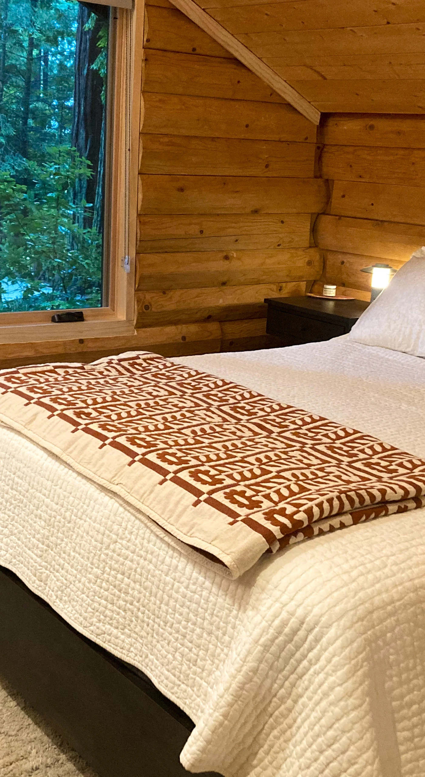 Awaken to the soft glow of morning light in the master bedroom, where nature's beauty is just outside your window.