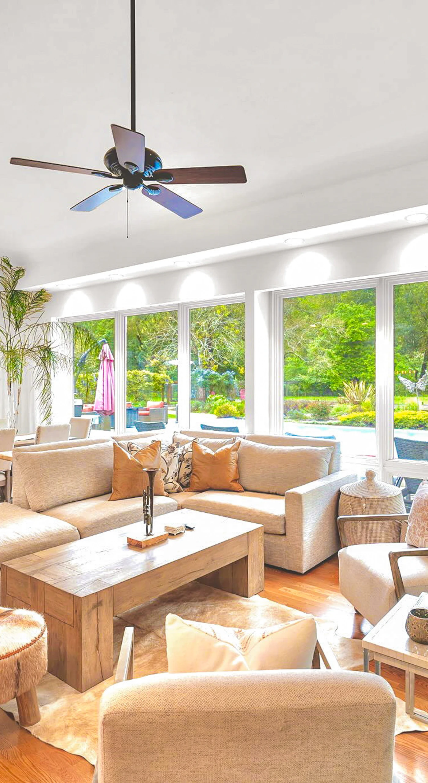 Walls of windows flood your great room with natural light — sink into plush seating and gaze out at the gardens after a day exploring Sonoma tasting rooms