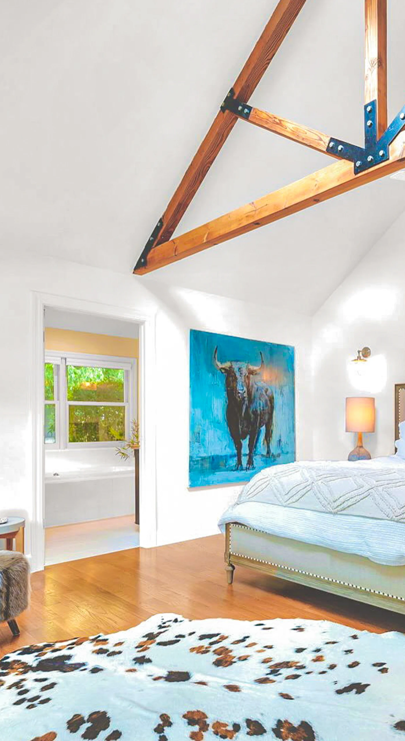 Retreat to your primary suite where soaring exposed beams, a skylight, and a king bed create a sanctuary worthy of Sonoma's finest wine country estates