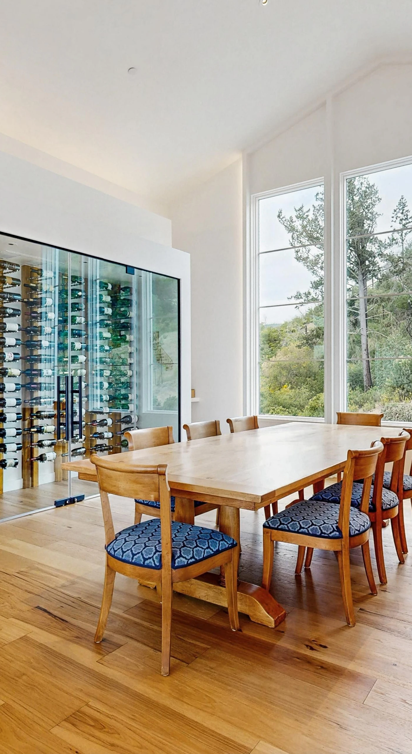 Toast your Calistoga getaway at a dining table flanked by a stunning glass-enclosed wine cellar — the perfect stage for your favorite Sonoma County bottles.