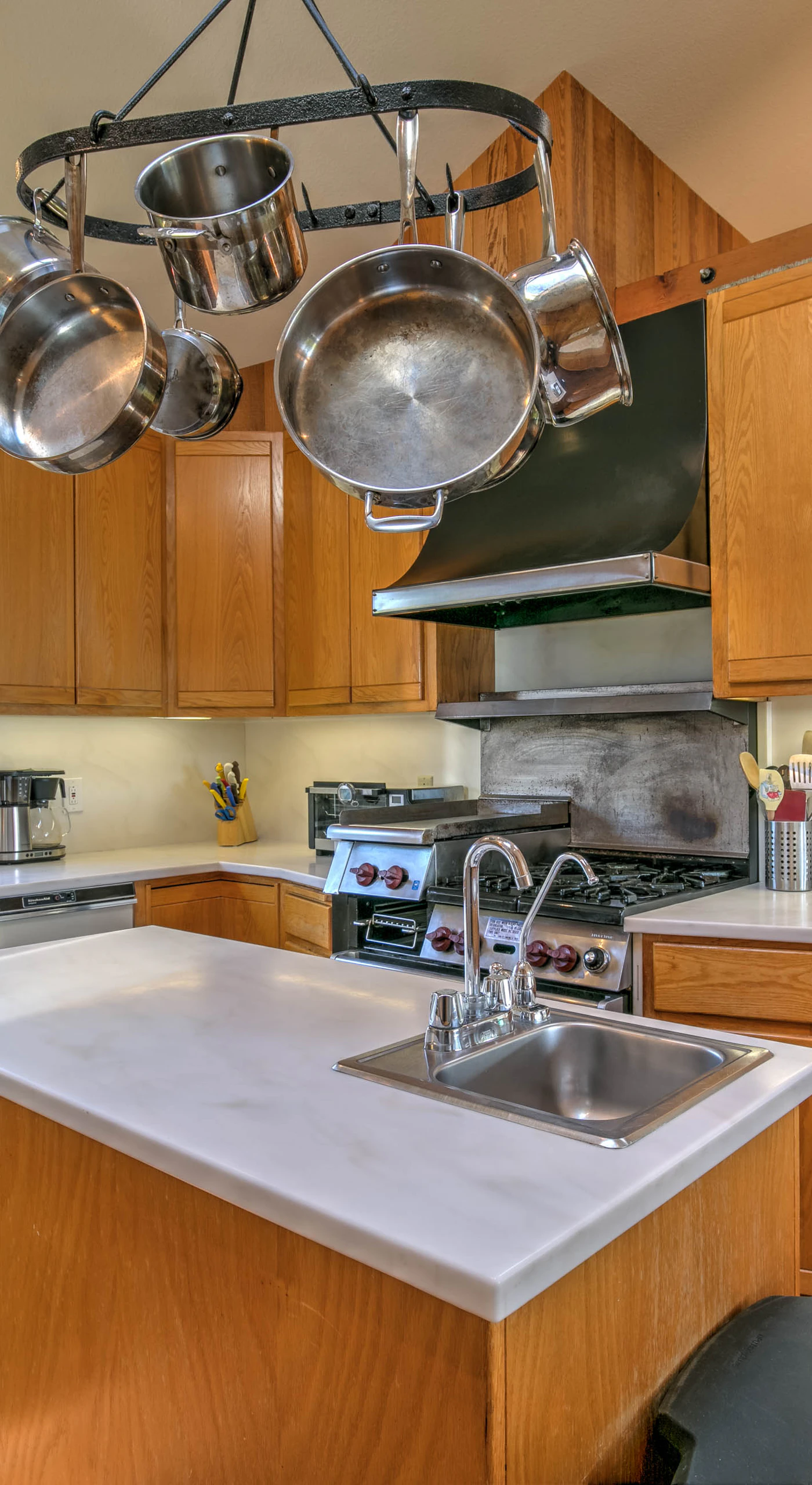 This functional kitchen combines style and convenience, making meal prep a breeze for your beachside getaway.